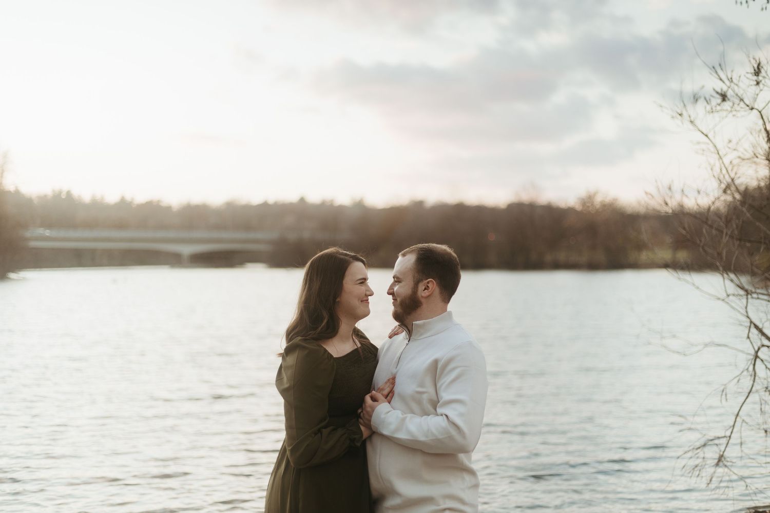 Candid couples photo session in Ann Arbor, Michigan captured in a park at golden hour