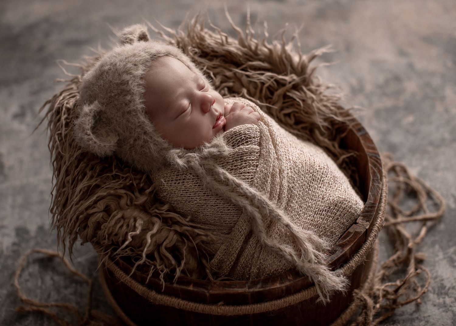 Temecula newborn photographer providing studio posed newborn portraits in a private Bonsall photography studio.