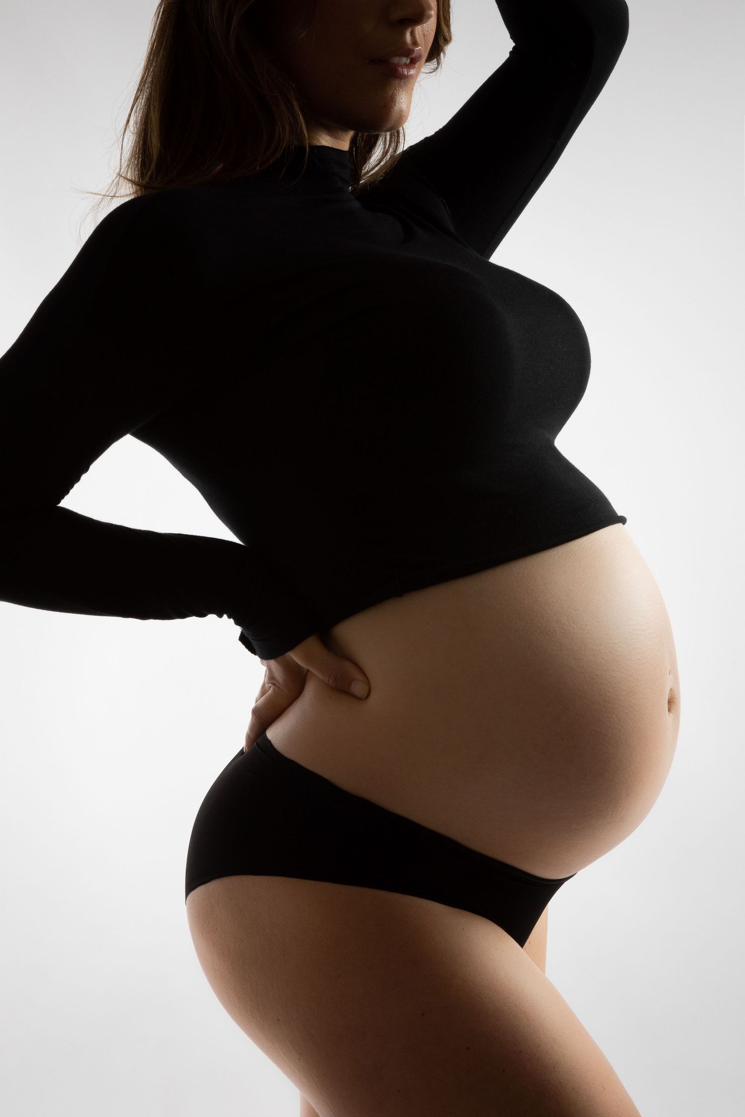 Elegant maternity photography in Bonsall CA studio capturing motherhood during pregnancy by portrait photographer