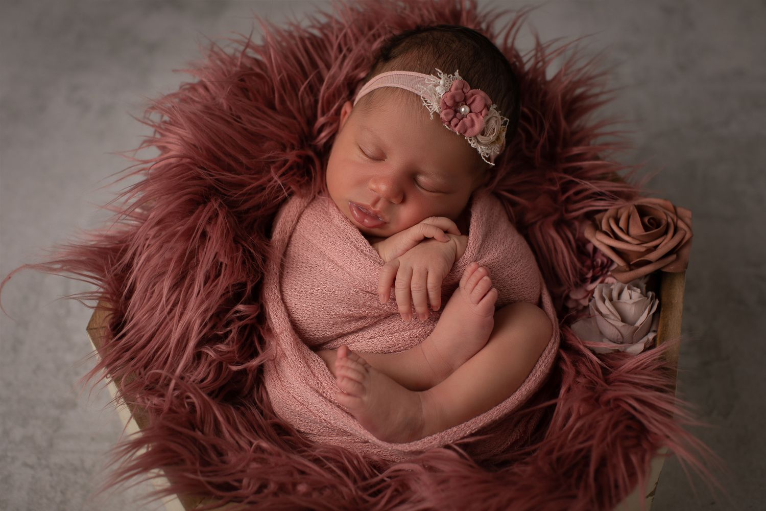 Oceanside CA newborn photographer specializing in studio baby portraits with timeless styling for North County San Diego families.