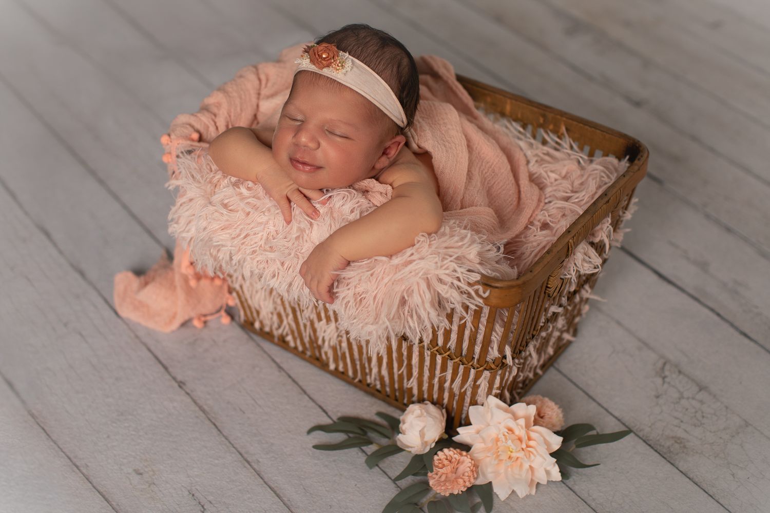 Oceanside CA newborn photographer specializing in studio baby portraits with timeless styling for North County San Diego families.