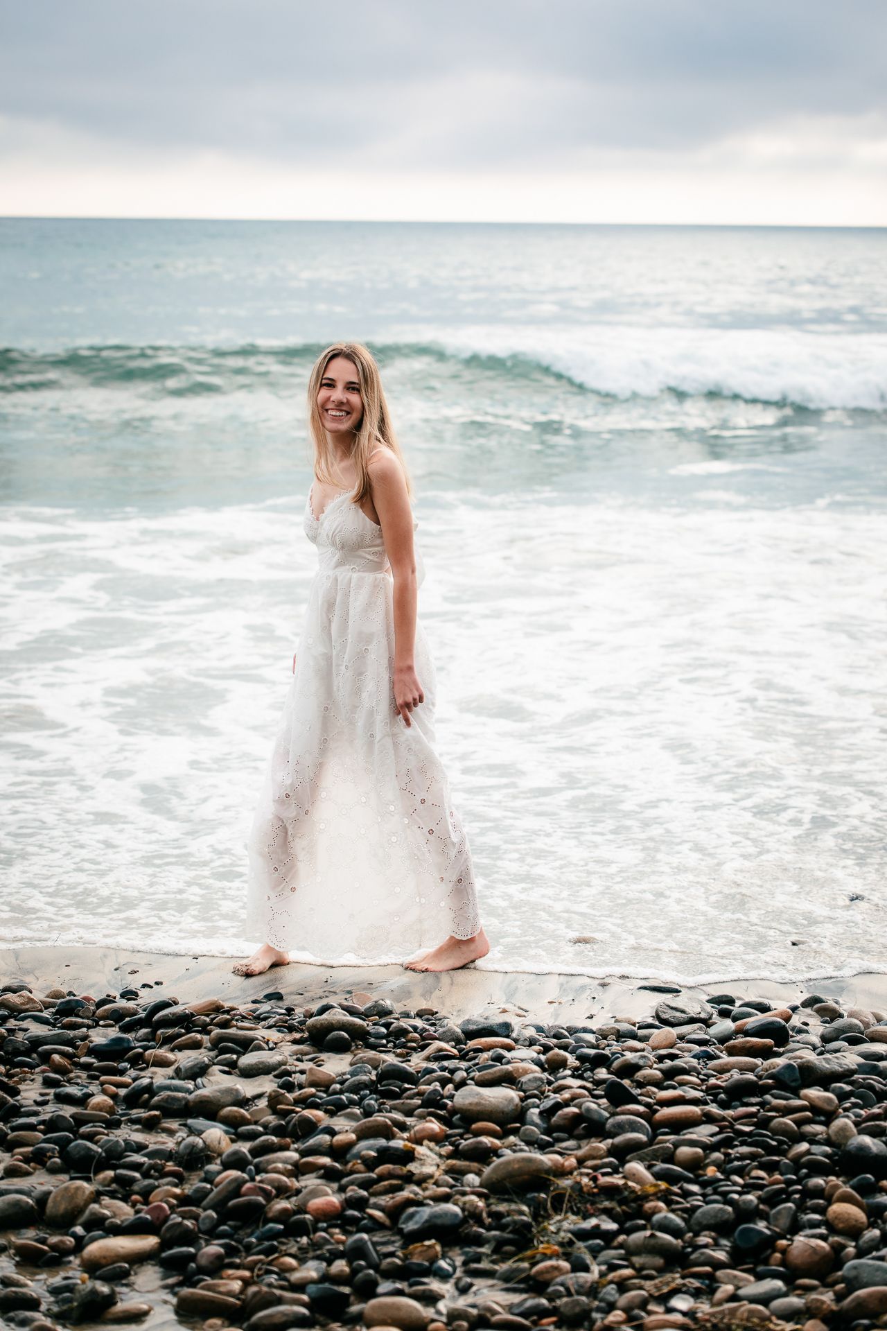 Beach high school senior photography session in Carlsbad, for high school graduation portraits.