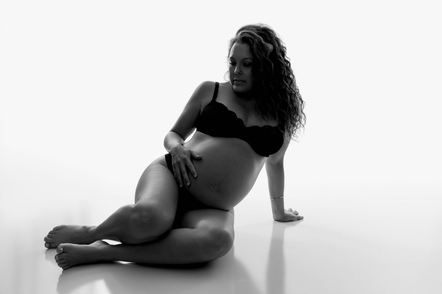 Elegant maternity photography in Vista CA studio capturing motherhood during pregnancy by portrait photographer