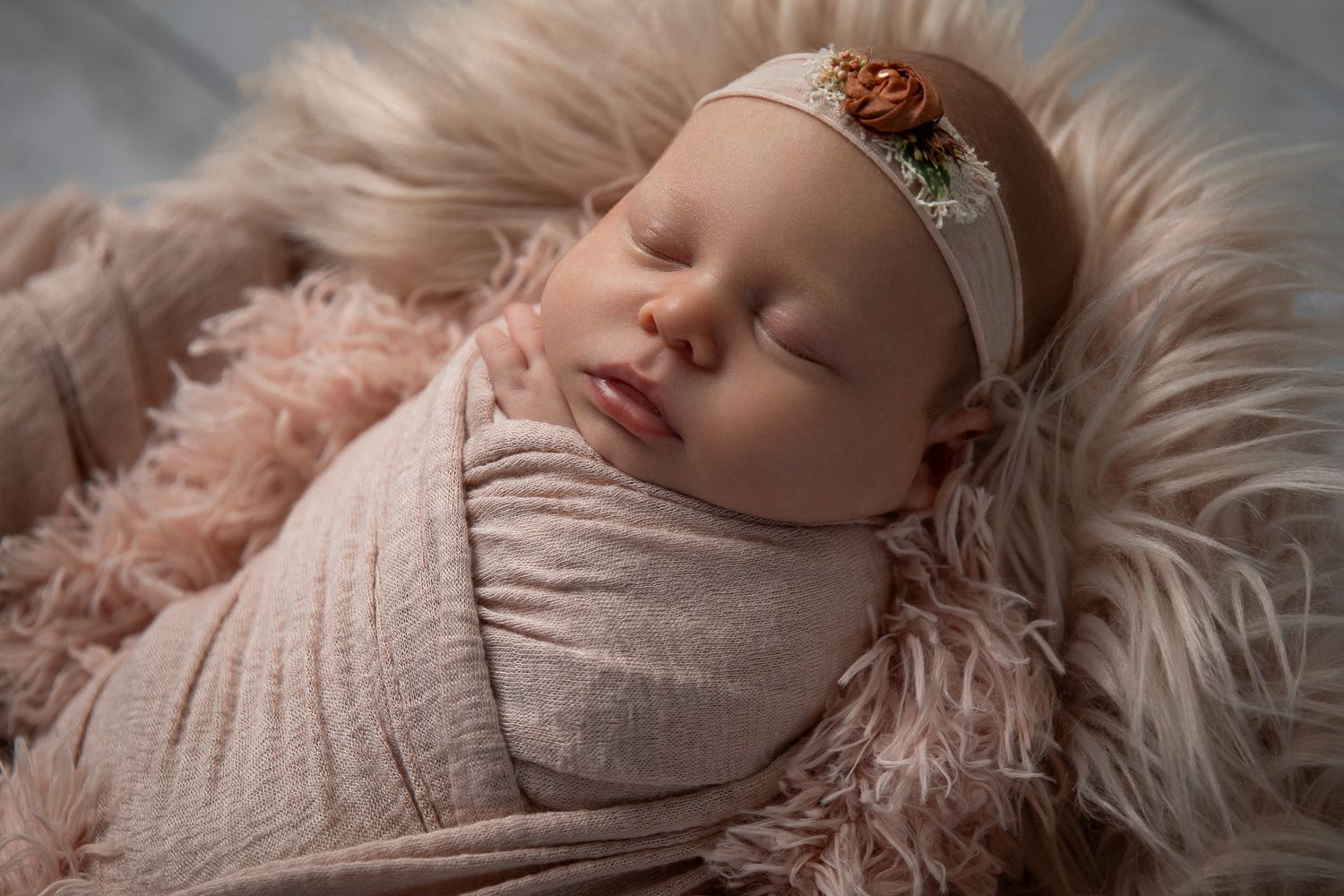 Temecula newborn photographer providing studio posed newborn portraits in a private Bonsall photography studio.