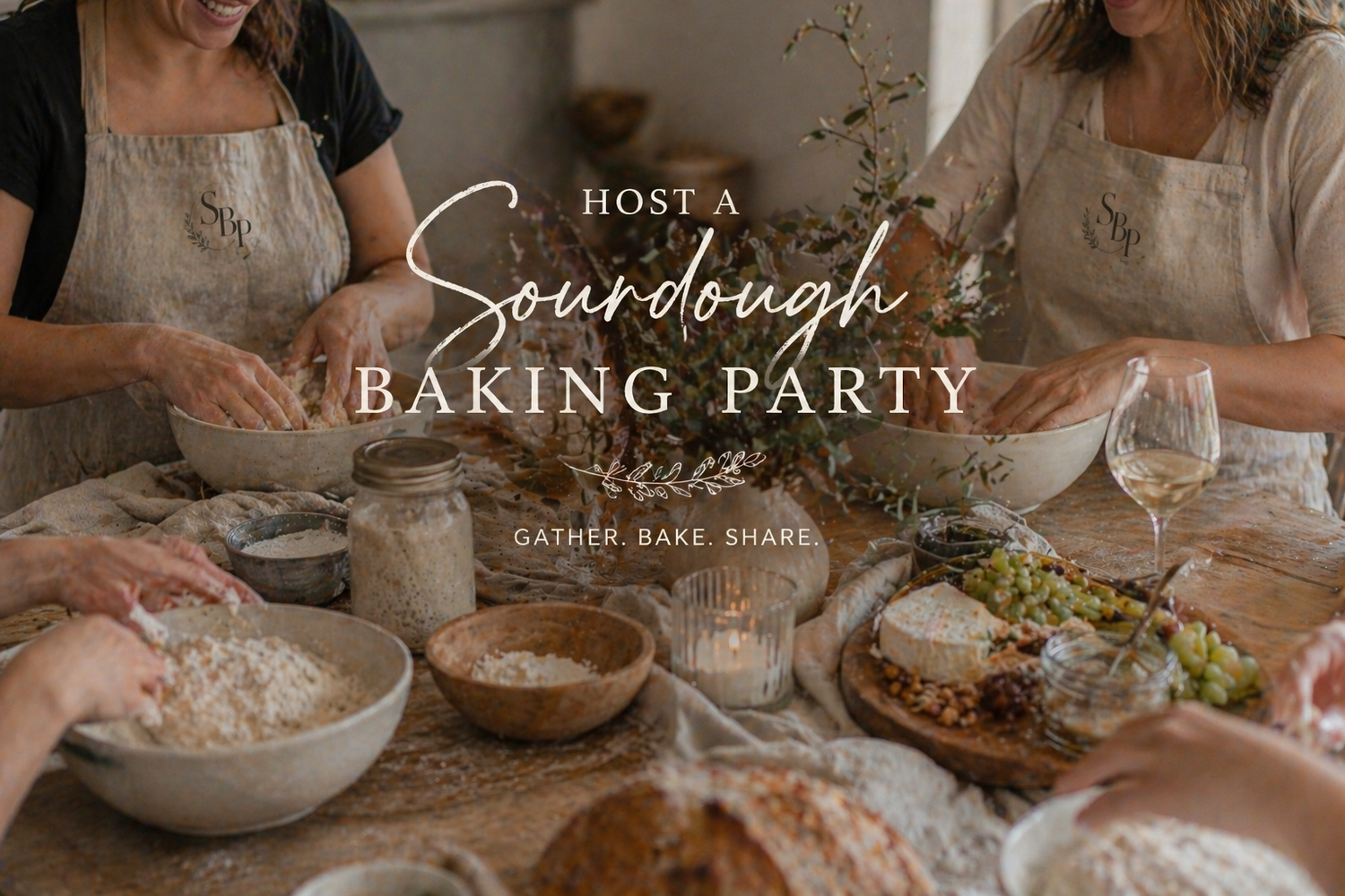 Women gather around a rustic table for a sourdough baking party, sharing bread, wine, and flour in a warm, inviting setting.