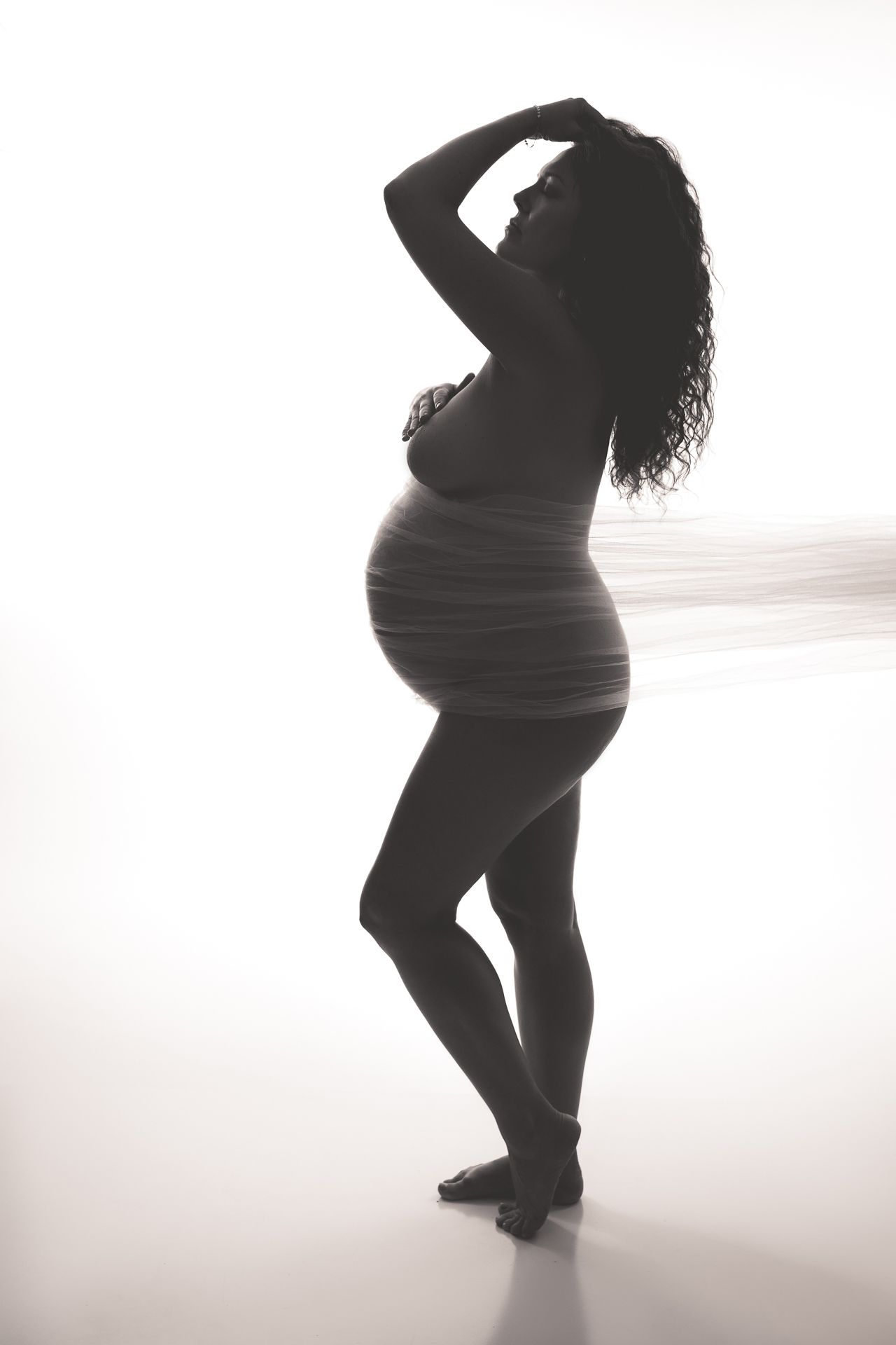 Light and airy maternity portrait in Oceanside CA studio session