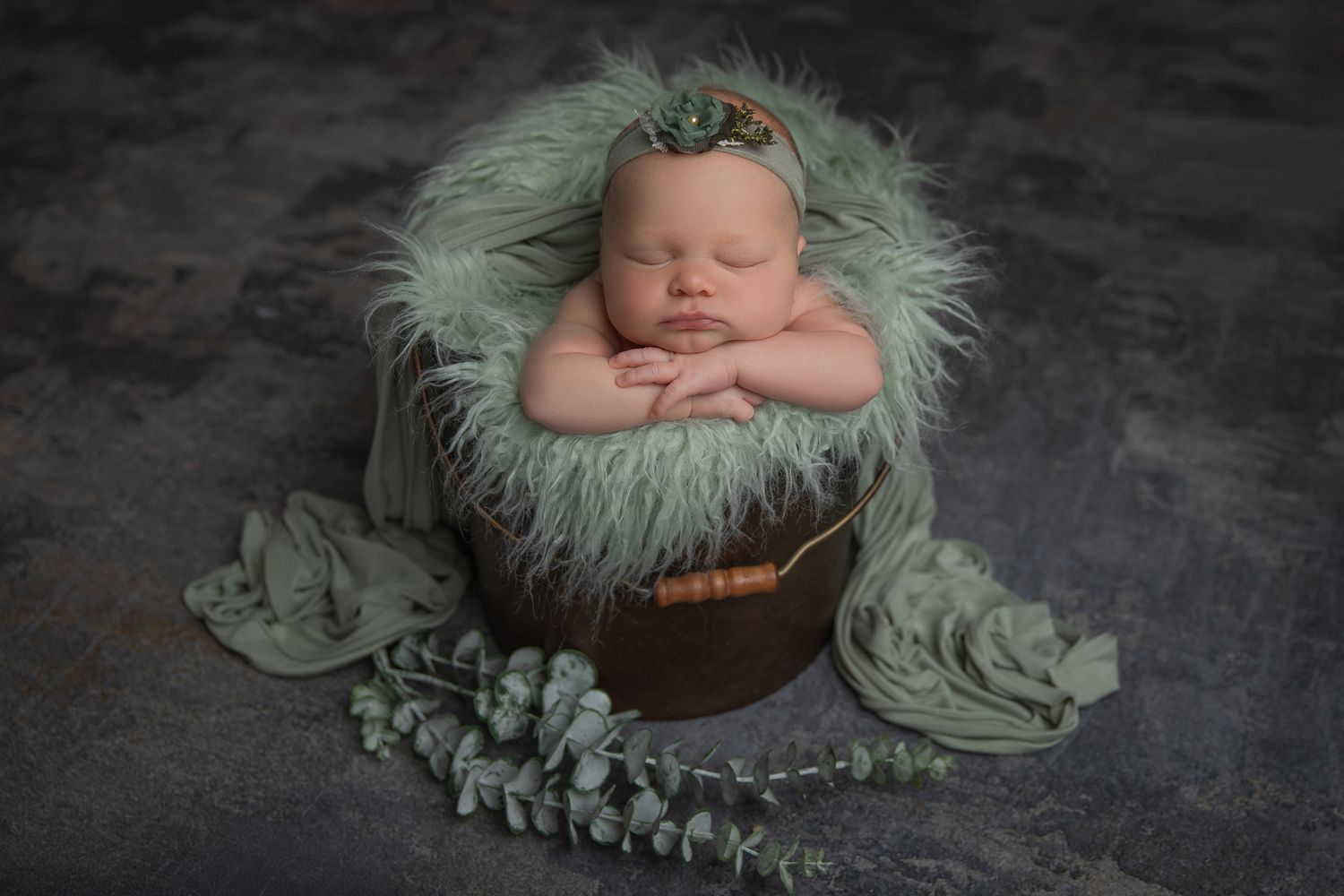 Oceanside CA newborn photographer specializing in studio baby portraits with timeless styling for North County San Diego families.
