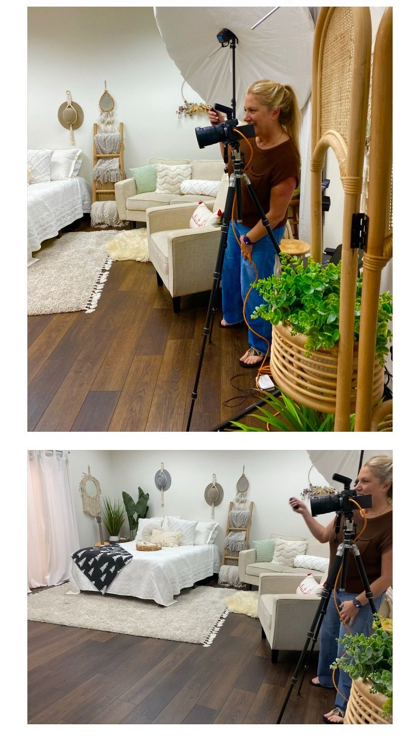 Blonde woman photographer using camera on tripod in bright boho-styled studio with white furniture and wood floors.