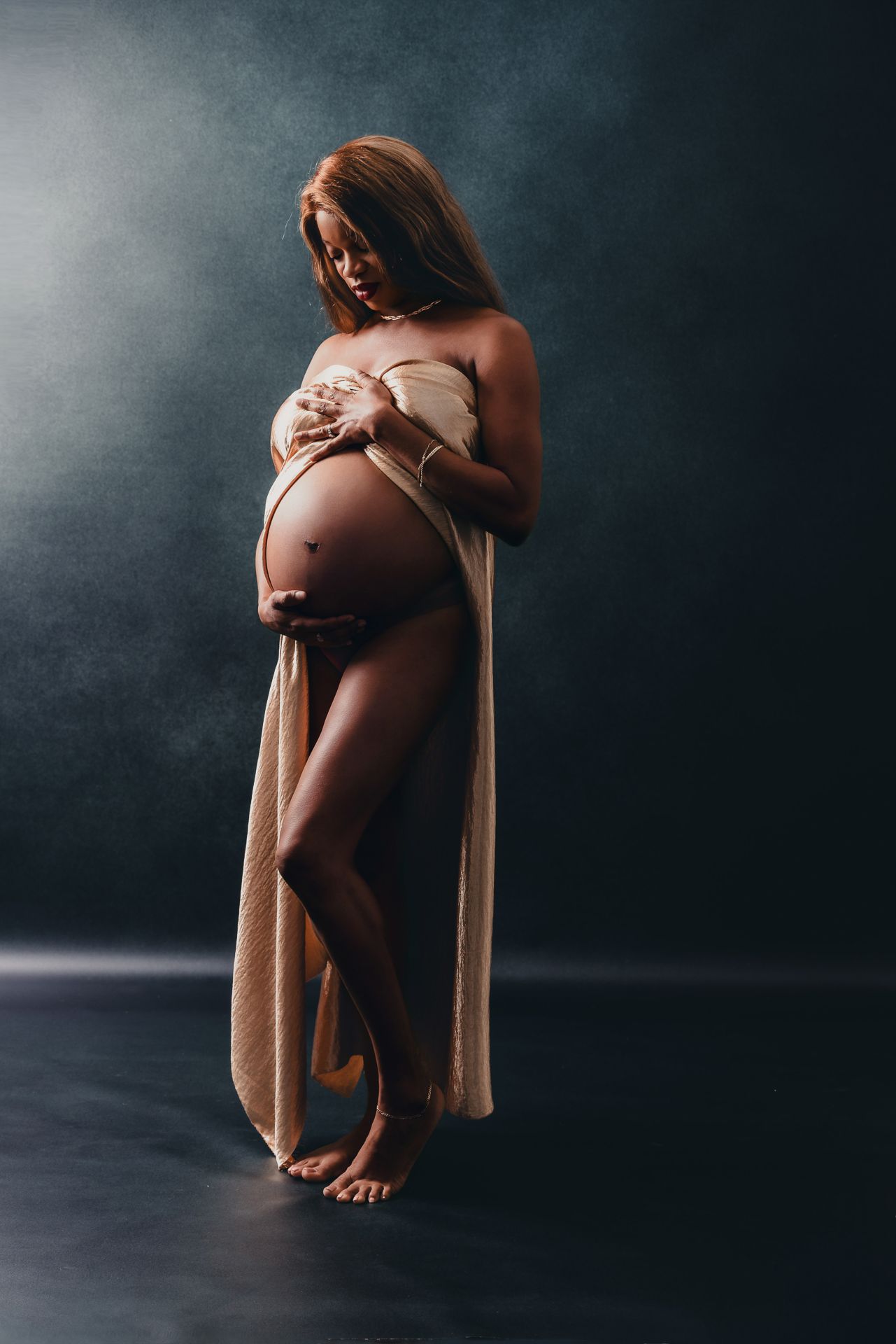 Studio maternity portrait in Bonsall CA for expecting mother photographed in North County San Diego