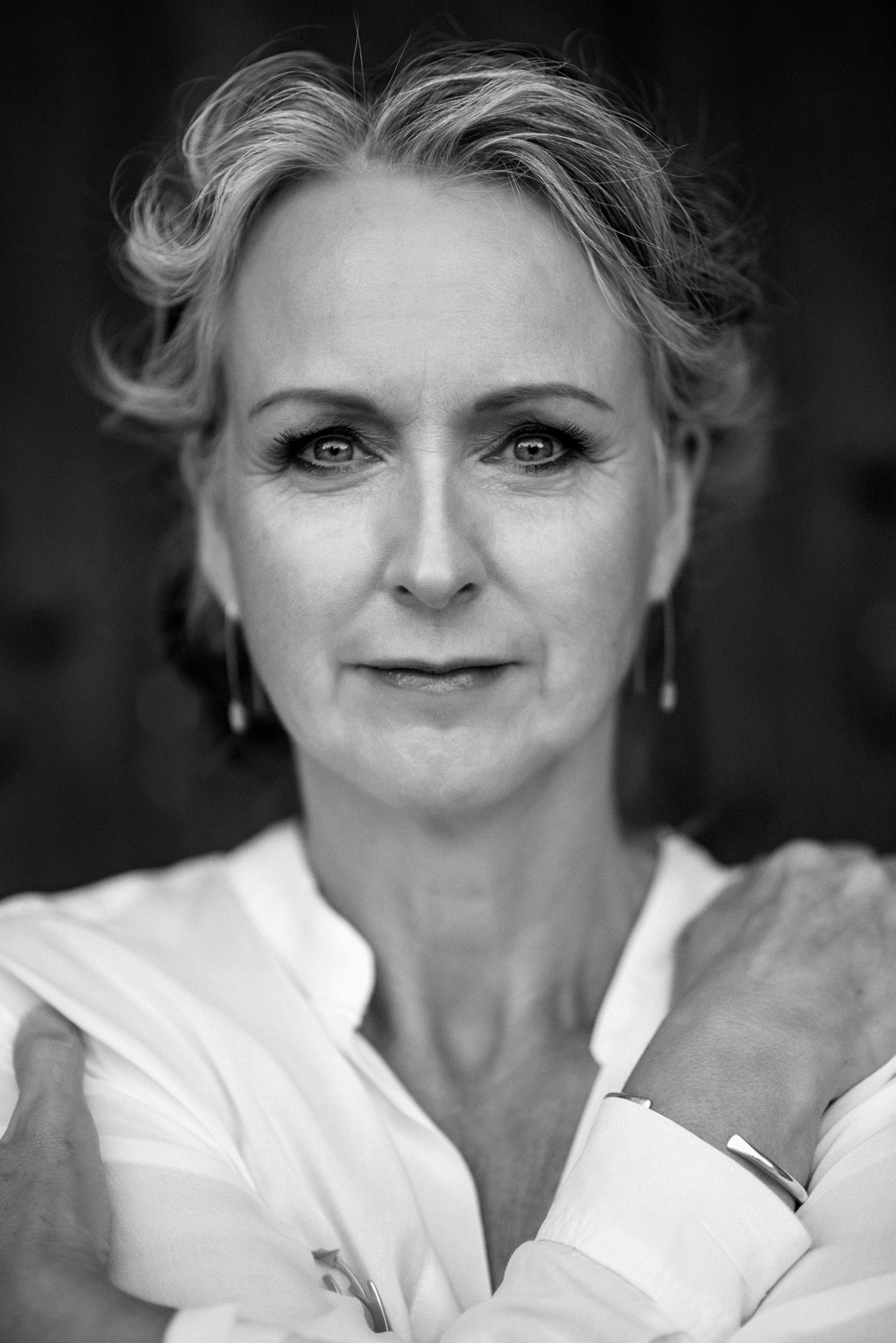Black and white portrait series showing expressive close-up shots.