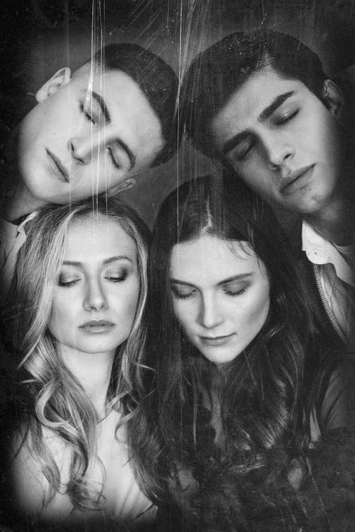 Black and white portrait of four young adults with closed eyes, two women in front and two men behind them.