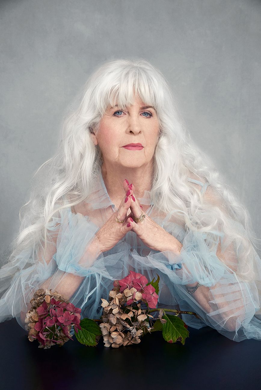 Mature woman in pale blue dress