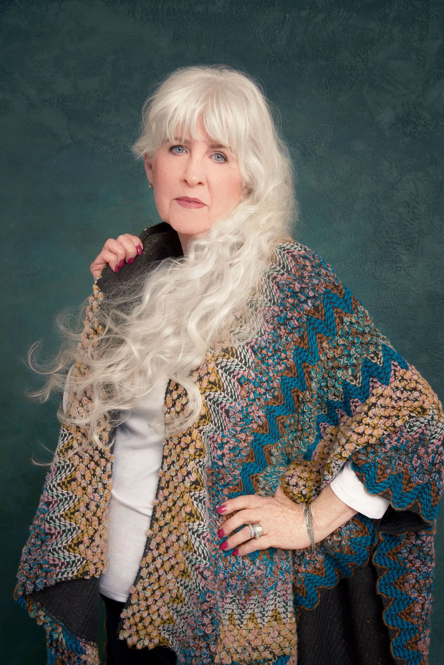 Mature woman with long white hair