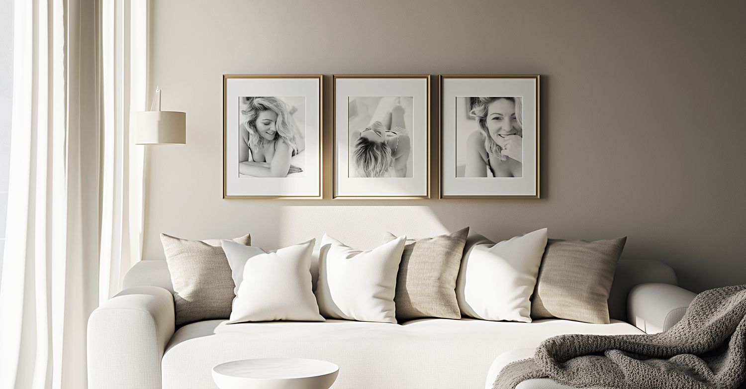 Modern neutral interior design with white molding and natural light streaming through windows.
