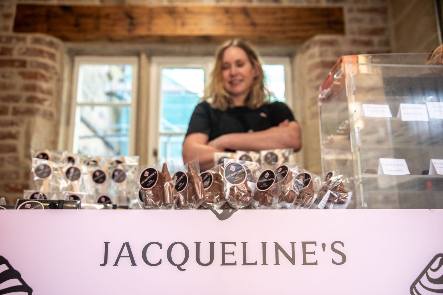 Close up of chocolate display counter at Jacqueline's confectionery.
