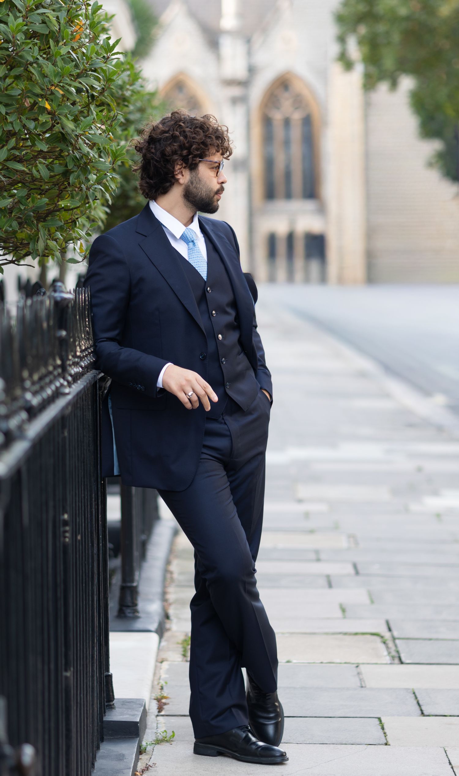 Elegant groom waiting in quiet Belgravia Street, wedding photography by Alba del Sol timeless wedding imagery