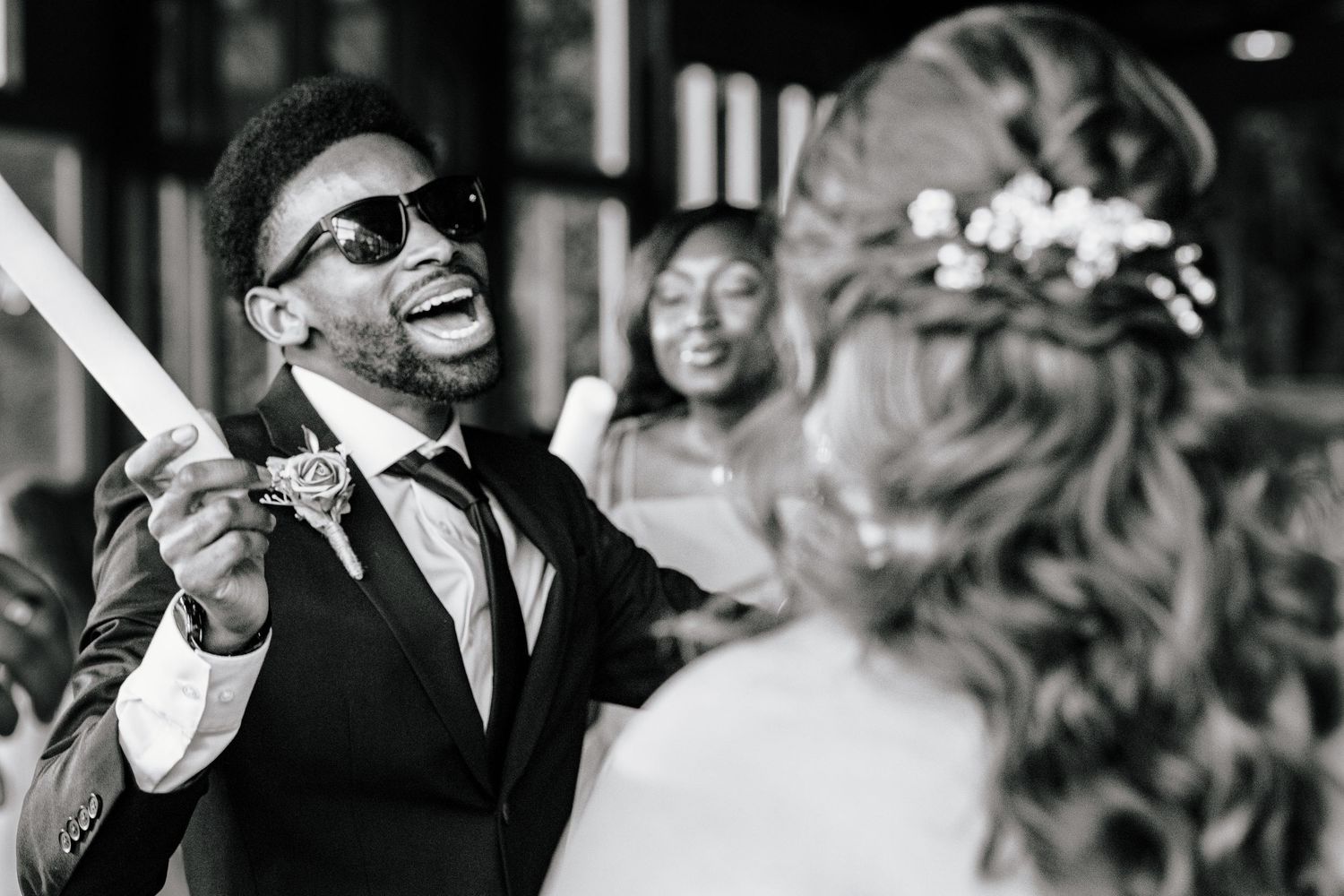 candid wedding photos in central Oregon at the water oasis. Beautiful wedding photos. Photo of the couple at reception. Moody