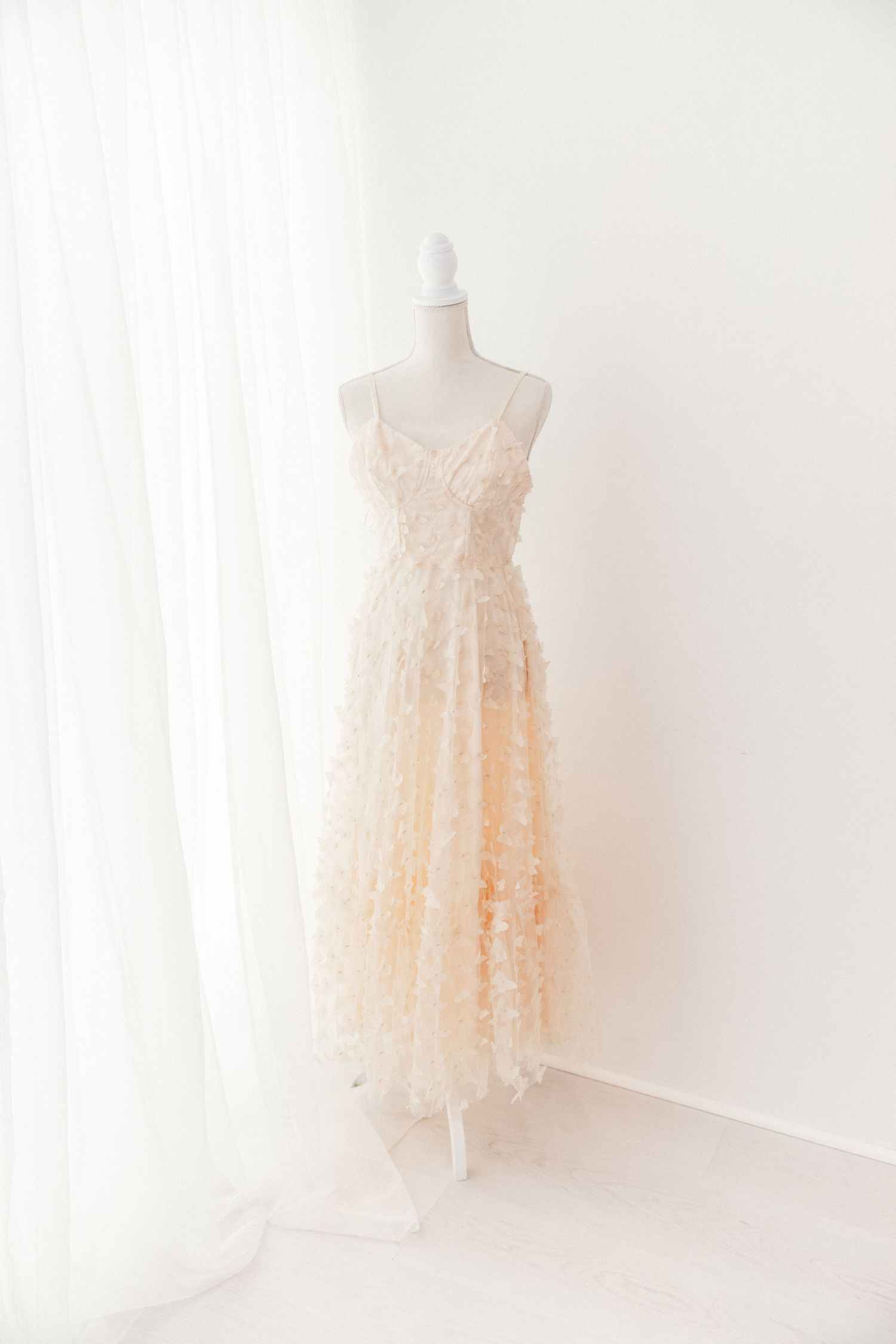 Blush 3D floral applique spaghetti strap tulle maxi dress on white mannequin.