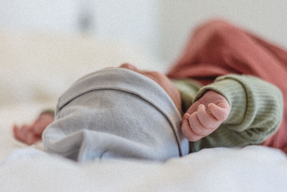 Sleeping is no object to newborn photography! More time to try artistic angles and soft focus.