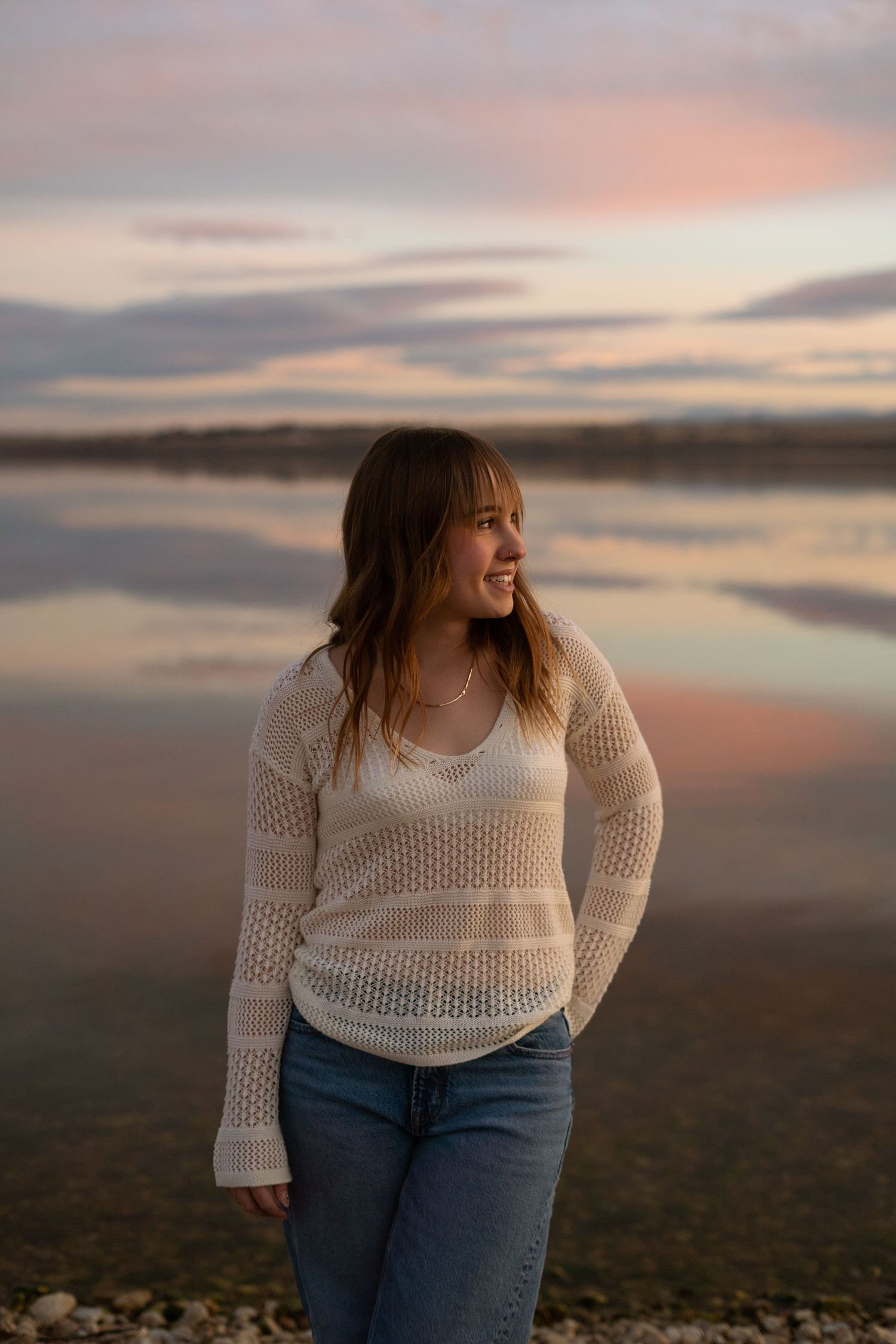Portrait photo, with sunset background.