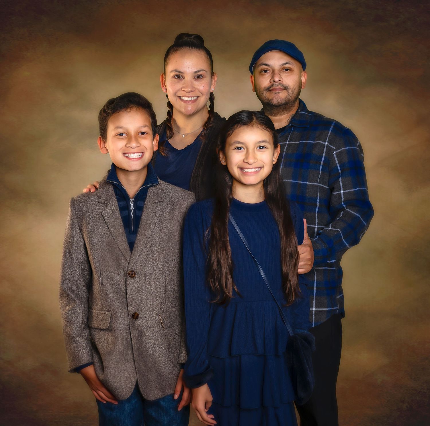 Family studio portrait photographed by TeamFlo Photography®