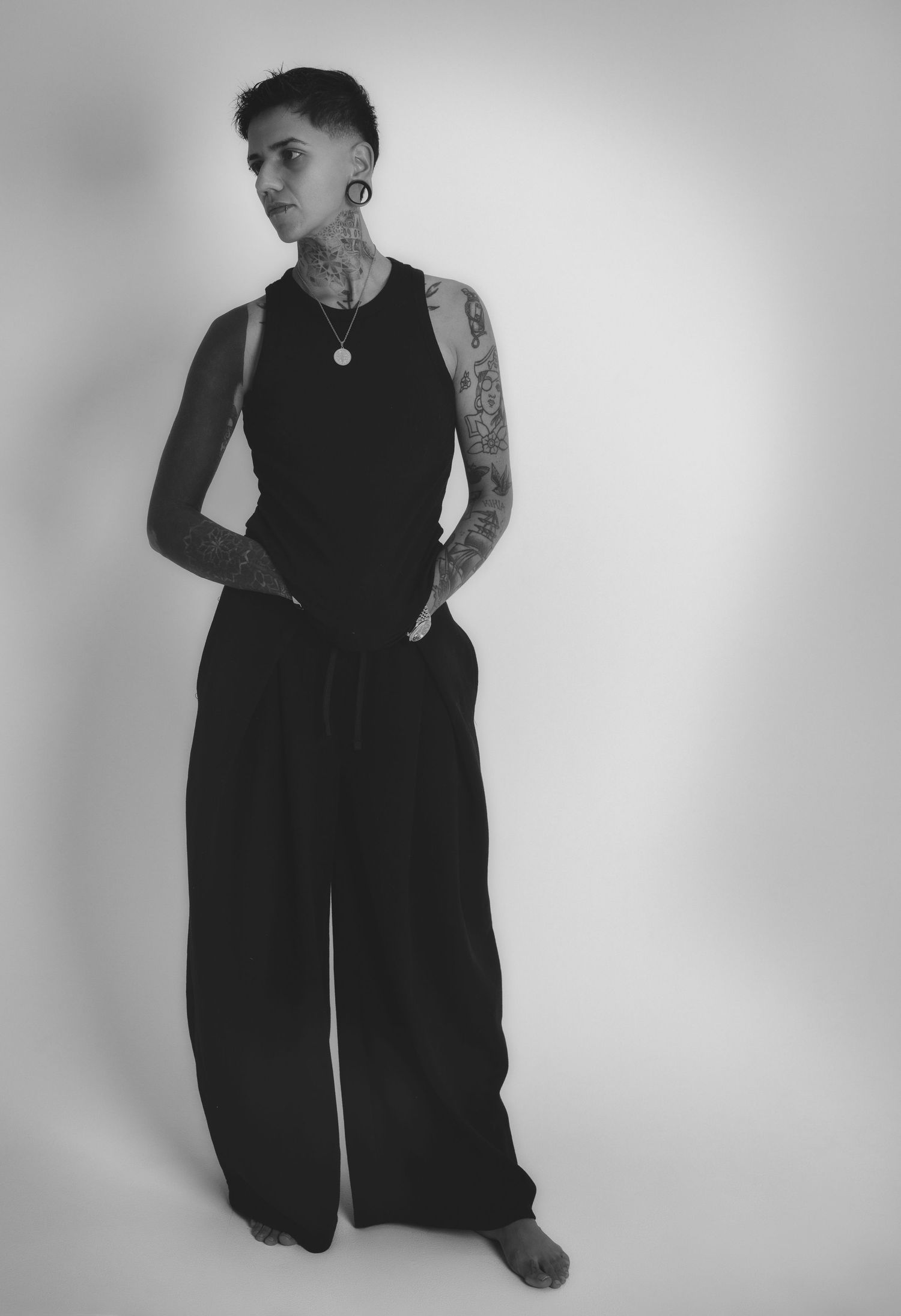 Black and white studio portrait in a modern fashion style