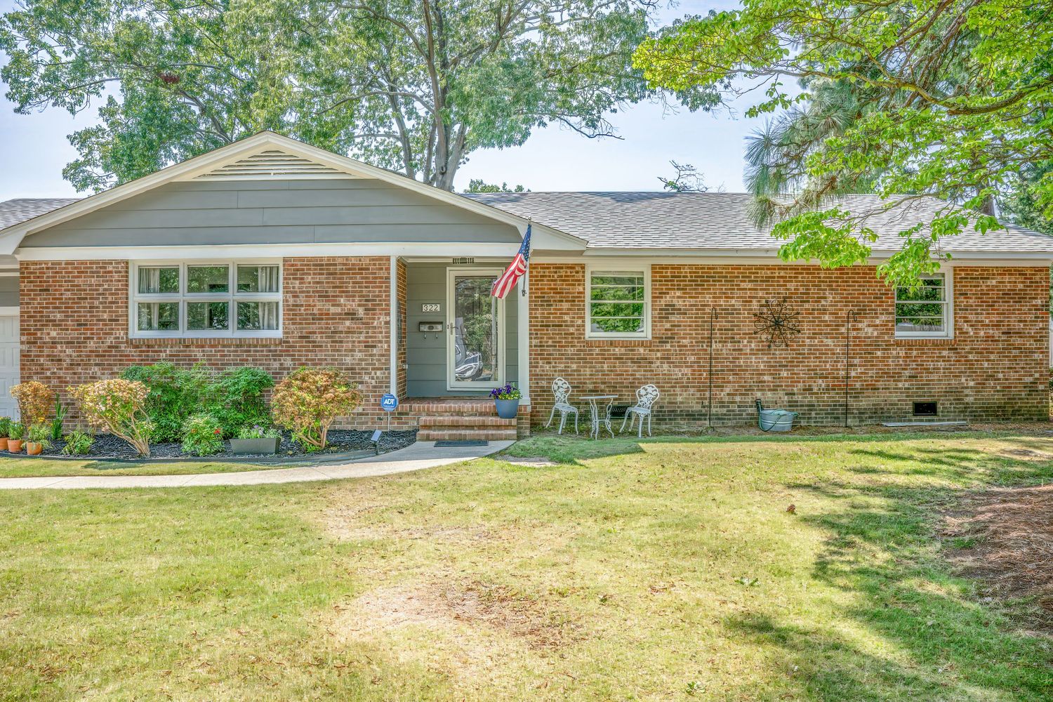 Professional real estate exterior photography of a brick home