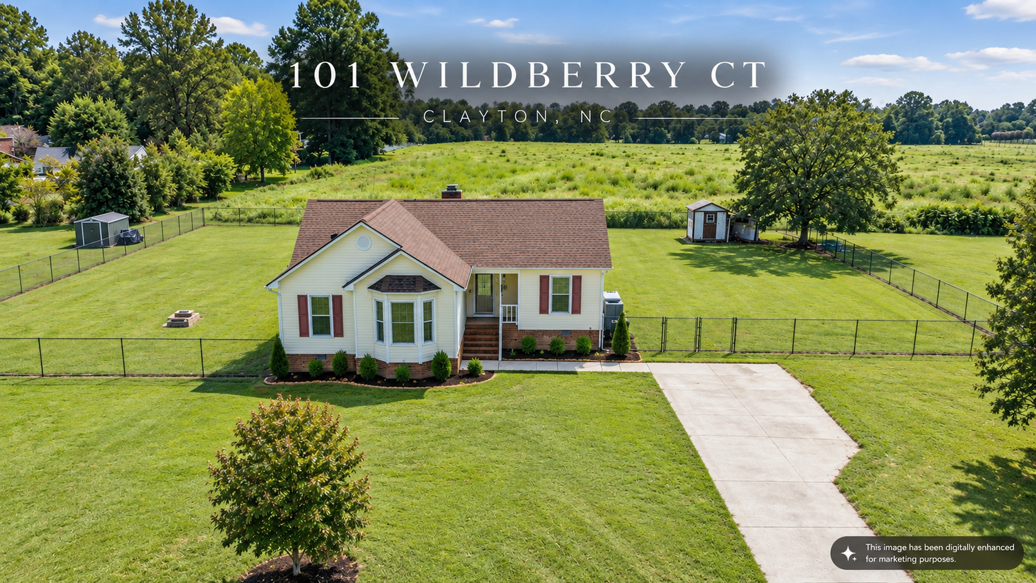 Aerial real estate photograph showing a home and surrounding property