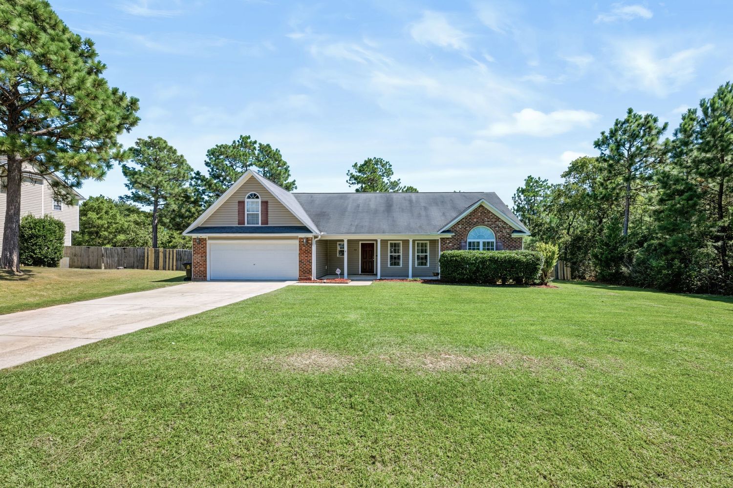 Exterior real estate photograph of a single-story home