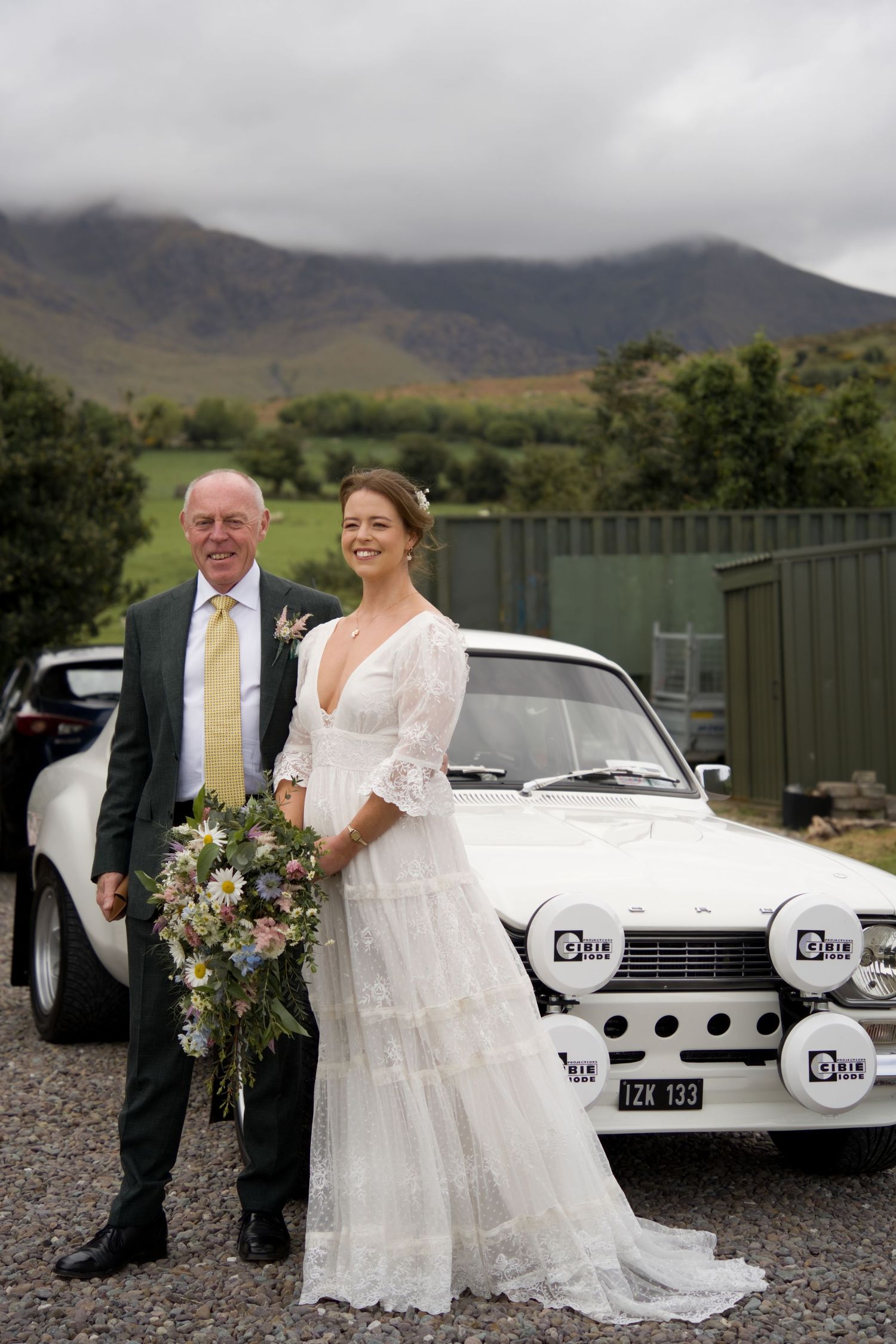 A bride and her father about to get in the car to go to a scenic rim wedding
