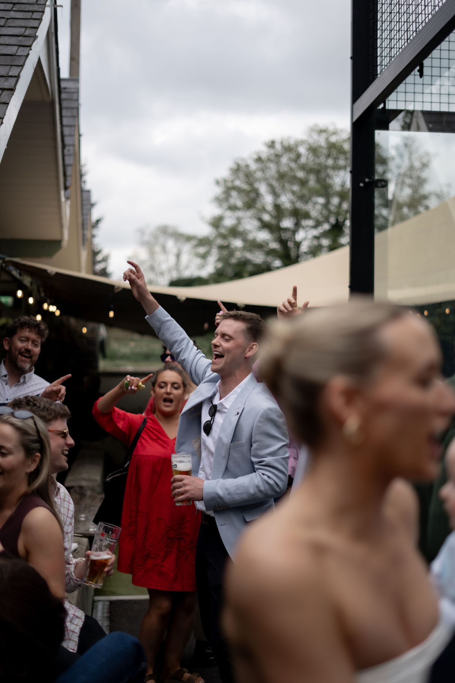 The groom dancing and singing at a Brisbane wedding