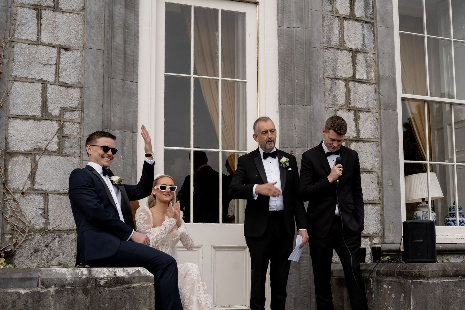 The bride, groom, father of the bride and MC at speeches at their Brisbane wedding