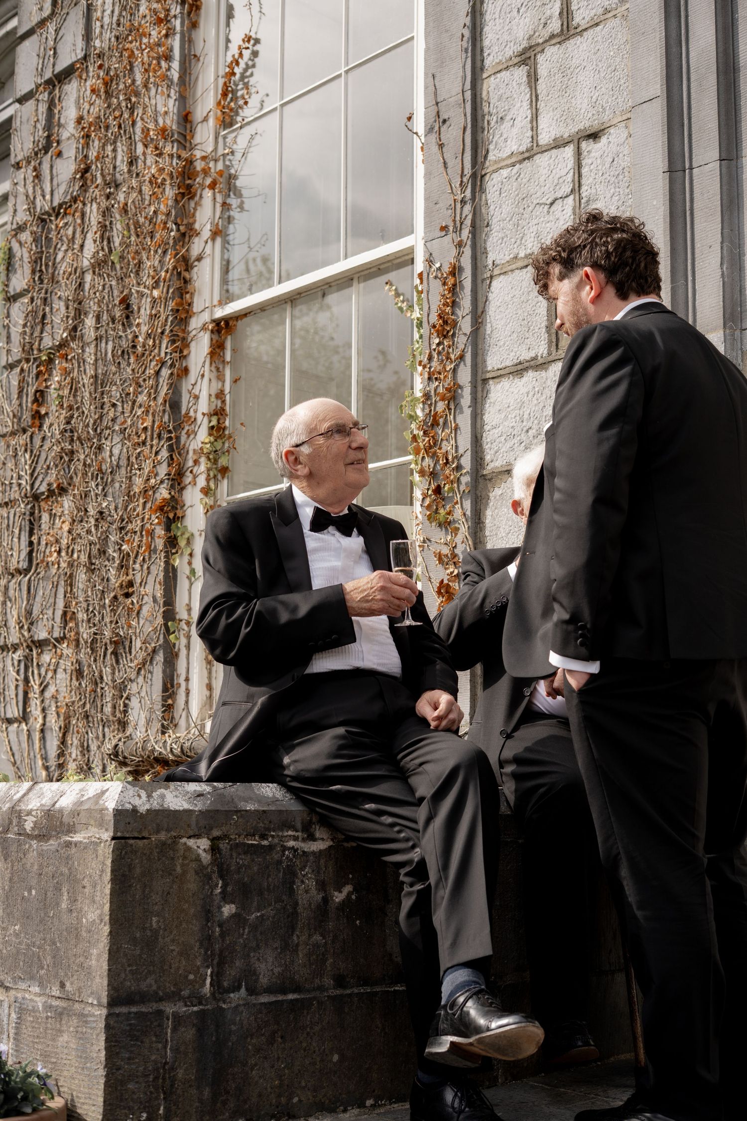 An older gentleman at a wedding