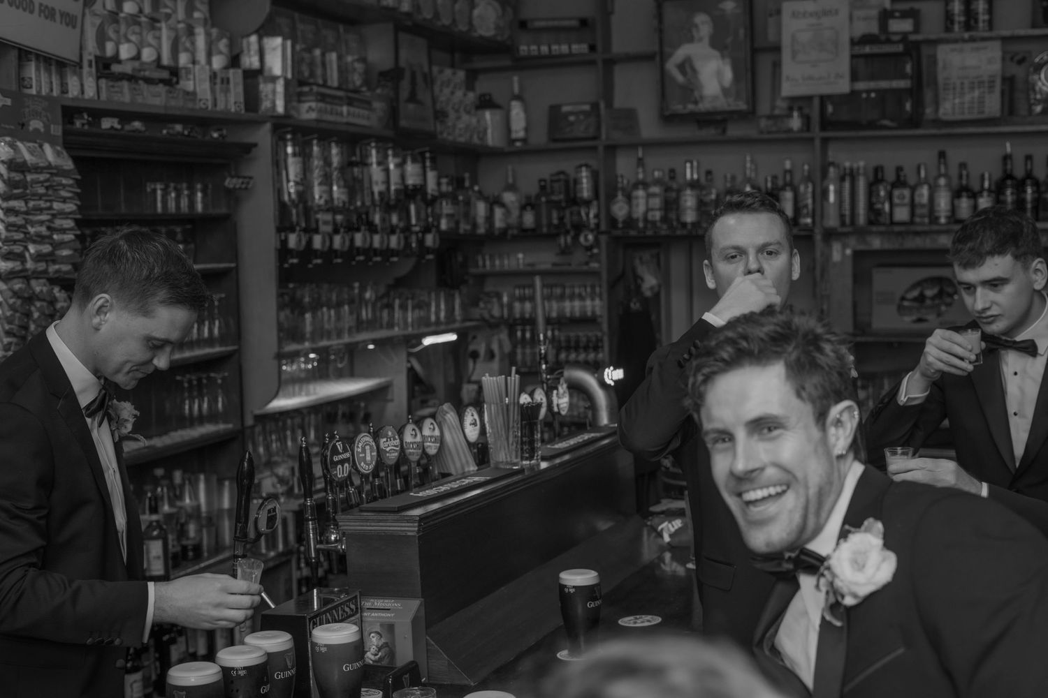 The groomsmen at a bar before the wedding ceremony
