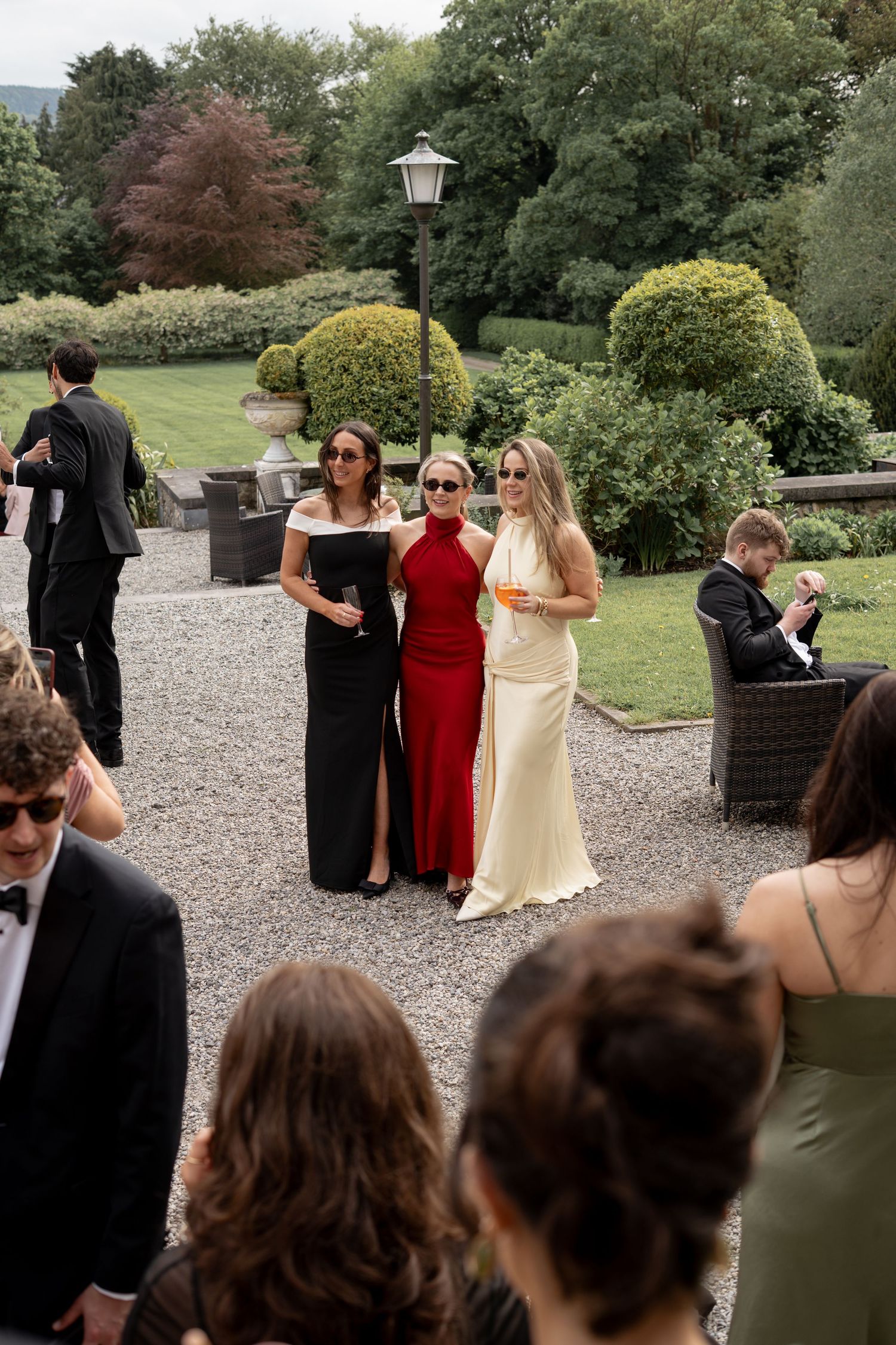 Friends getting a photo together at a Brisbane wedding