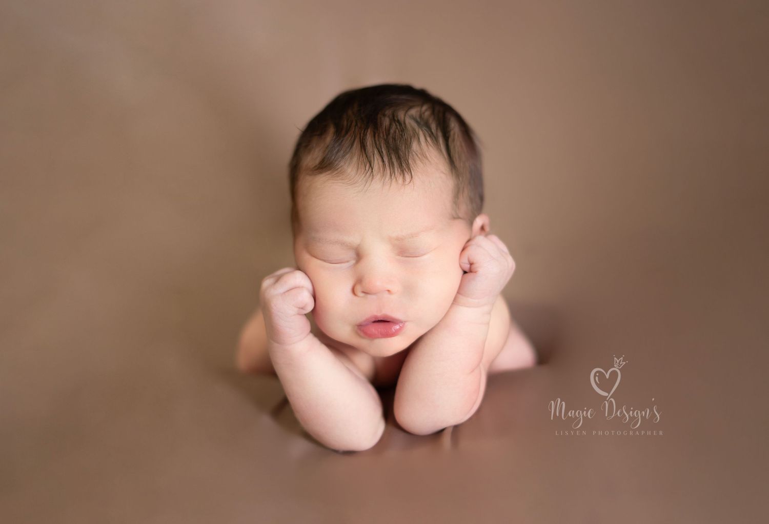 Artistic newborn photography series featuring sleeping baby in neutral brown tones.