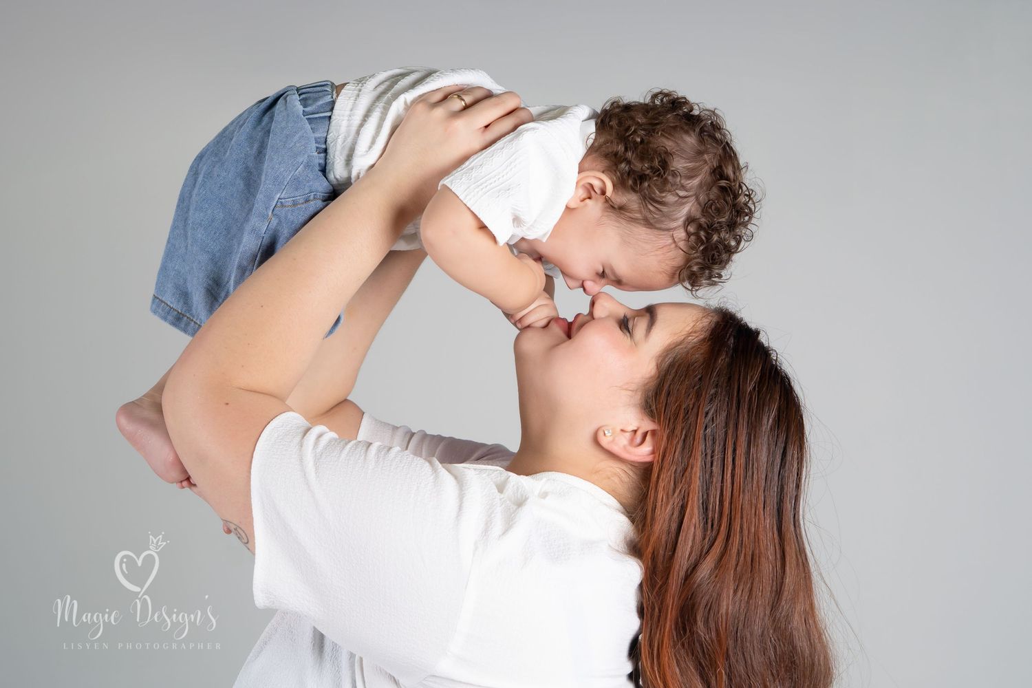 Studio family lifestyle portrait series on light gray background.