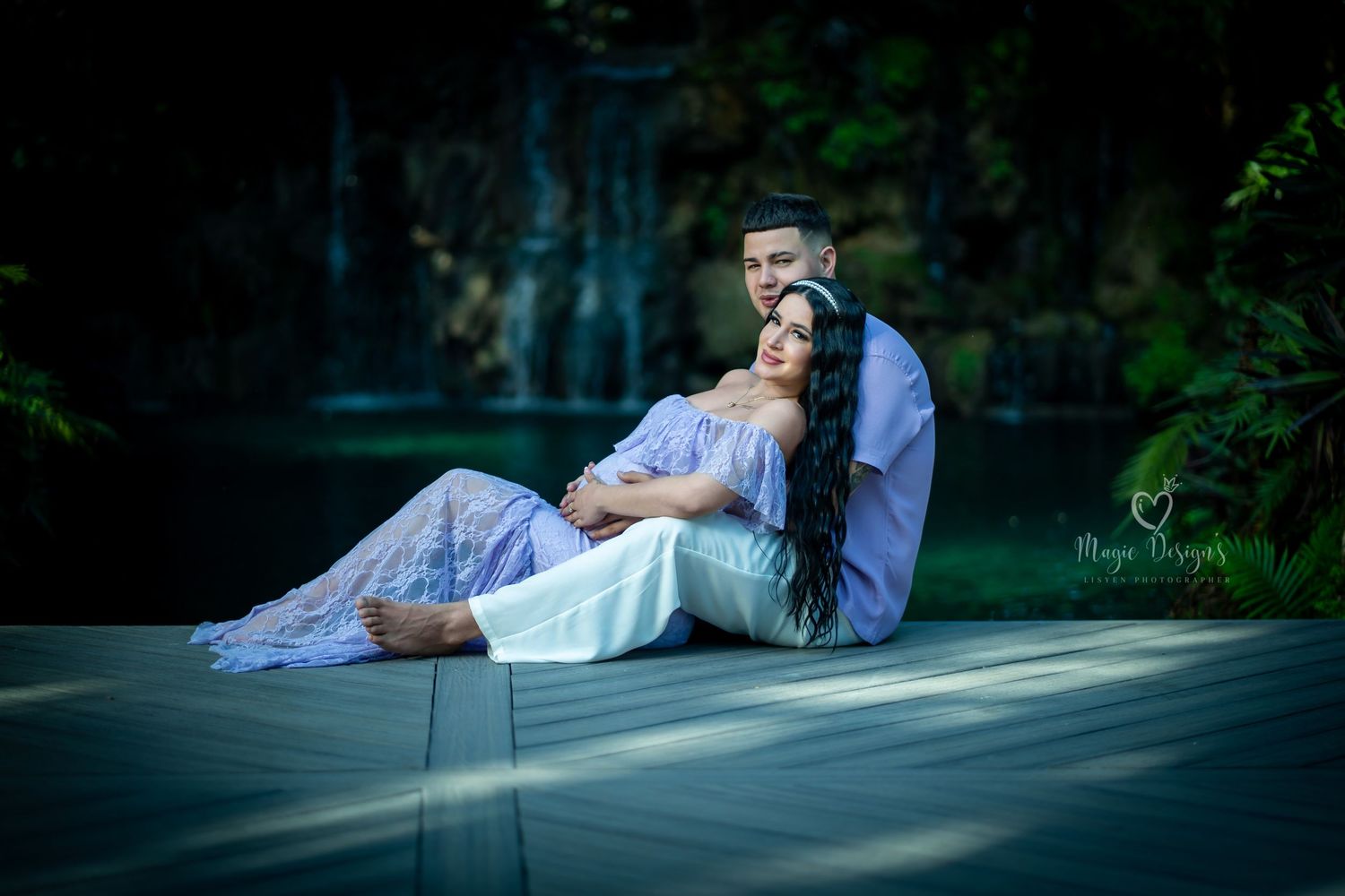 Ethereal outdoor photo series with blue dress and lush green scenery.
