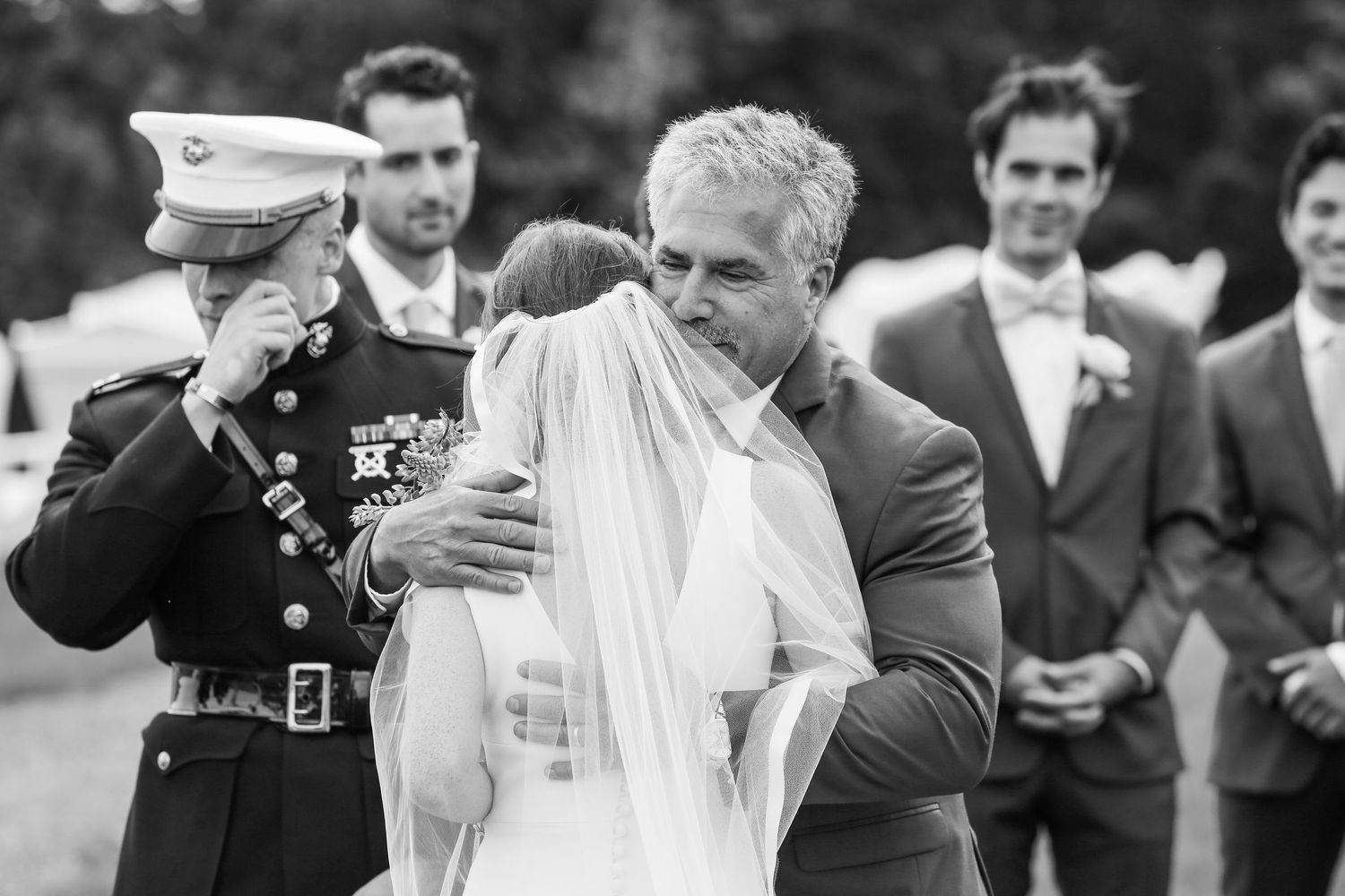 Black and white wedding photo collage showing intimate dancing and celebration moments.
