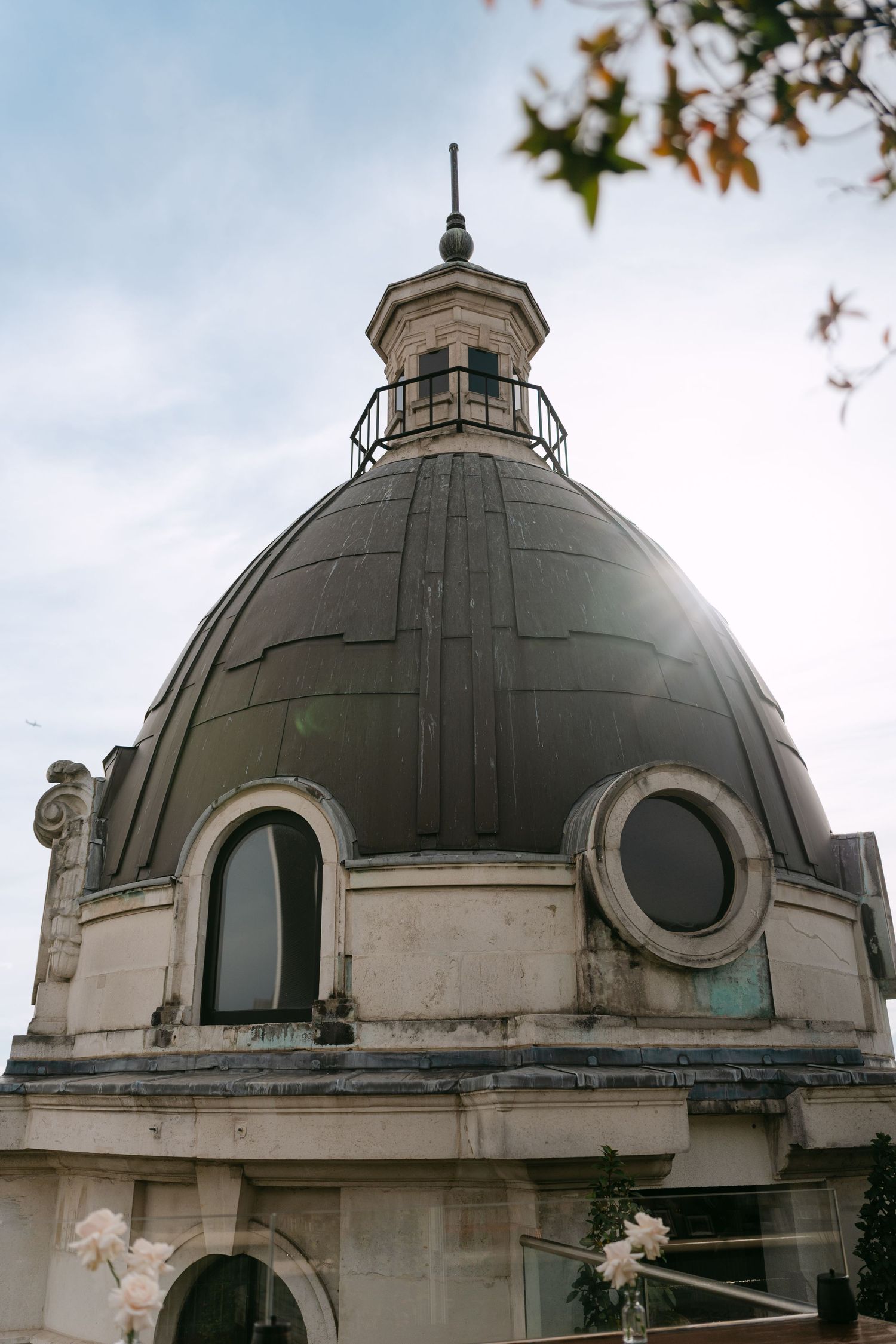 Historic domed architecture with circular windows photographed from below.
