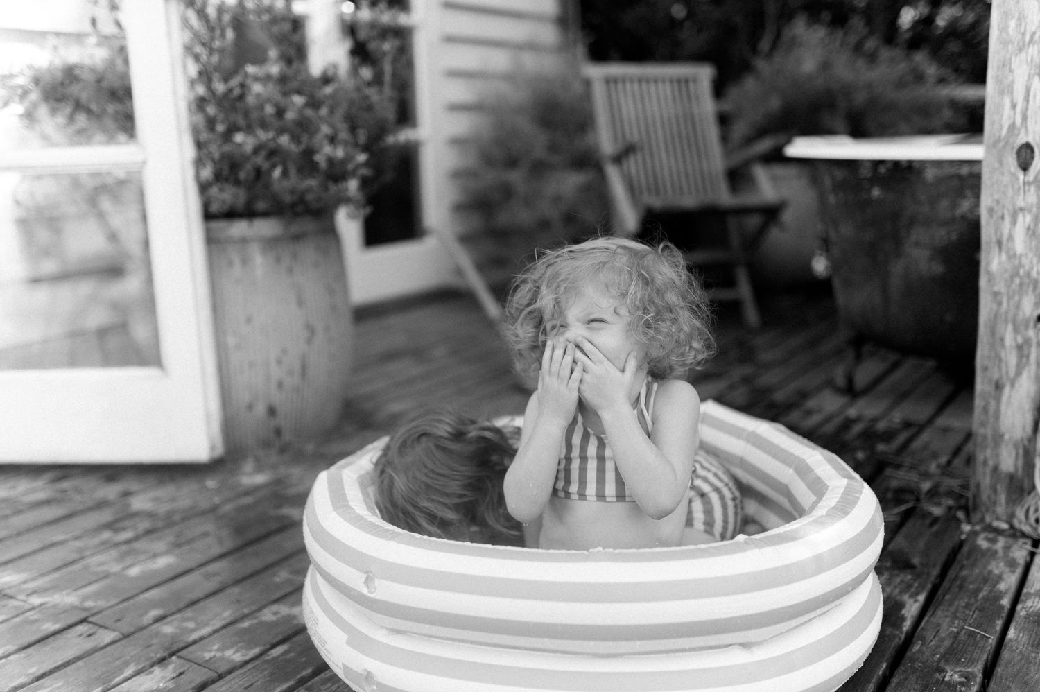 Vintage-style black and white photography of a rustic outdoor setting.