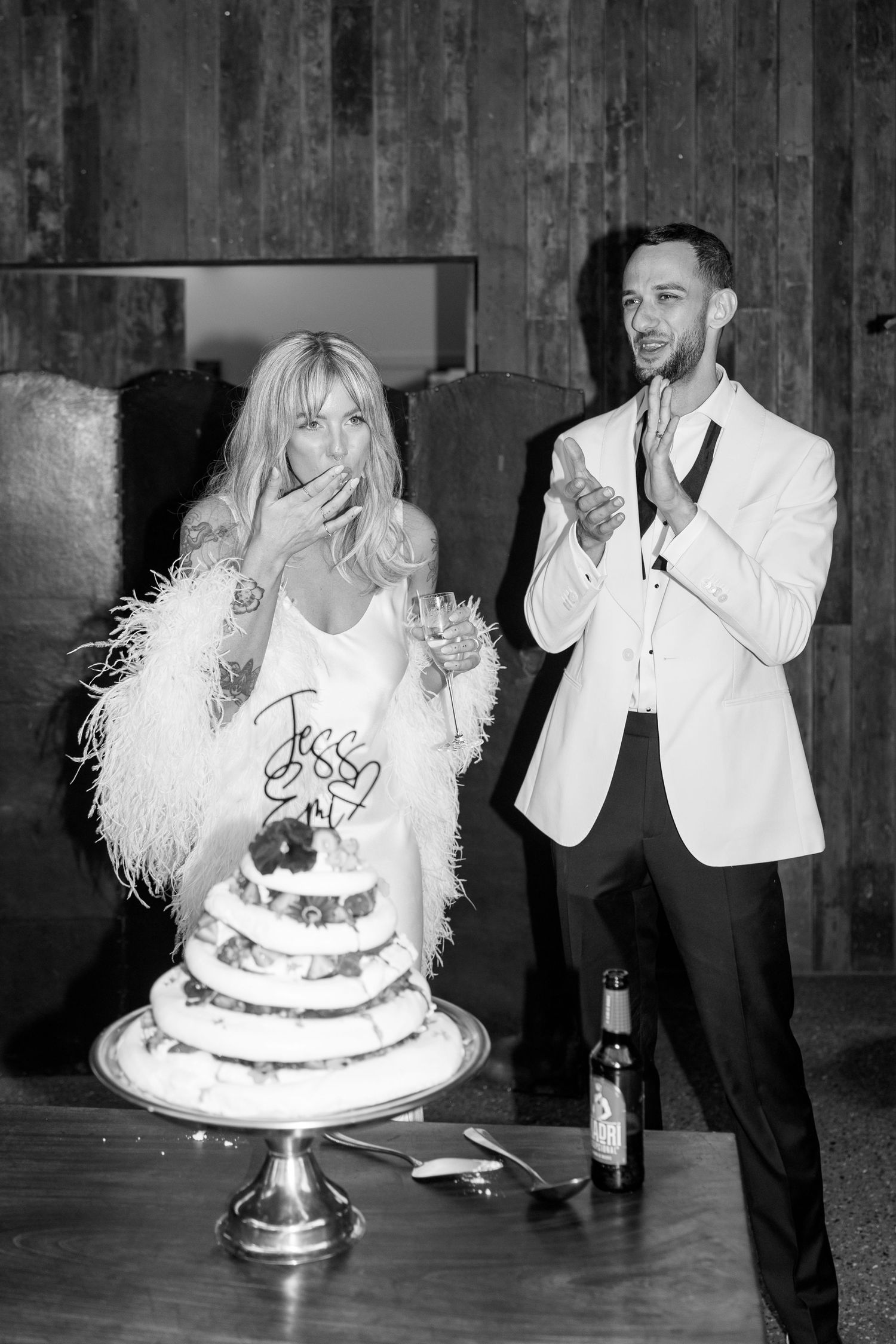 Series of candid moments as newlyweds share their wedding cake.