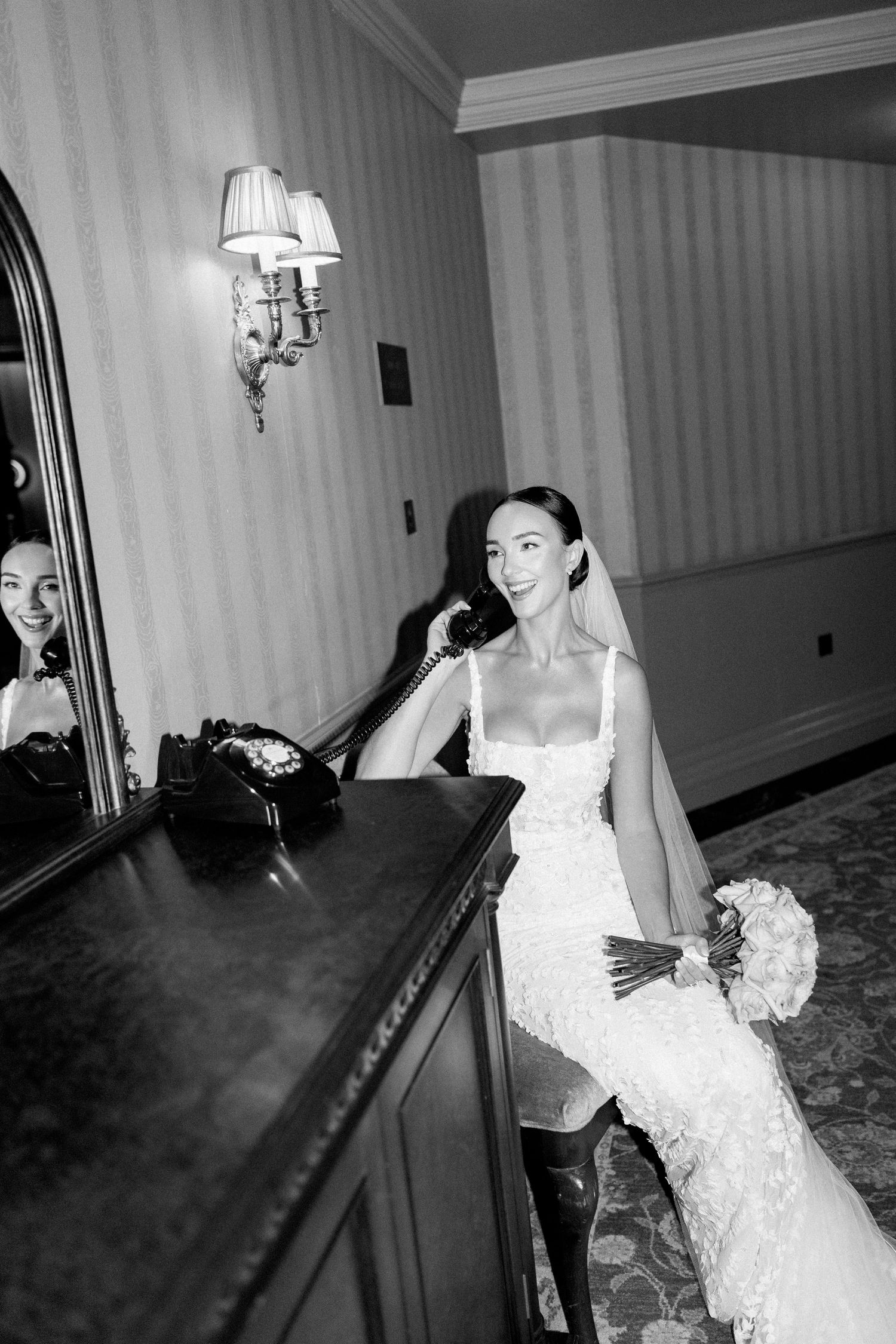 Black and white sequence of a bride posing playfully against a wooden railing.