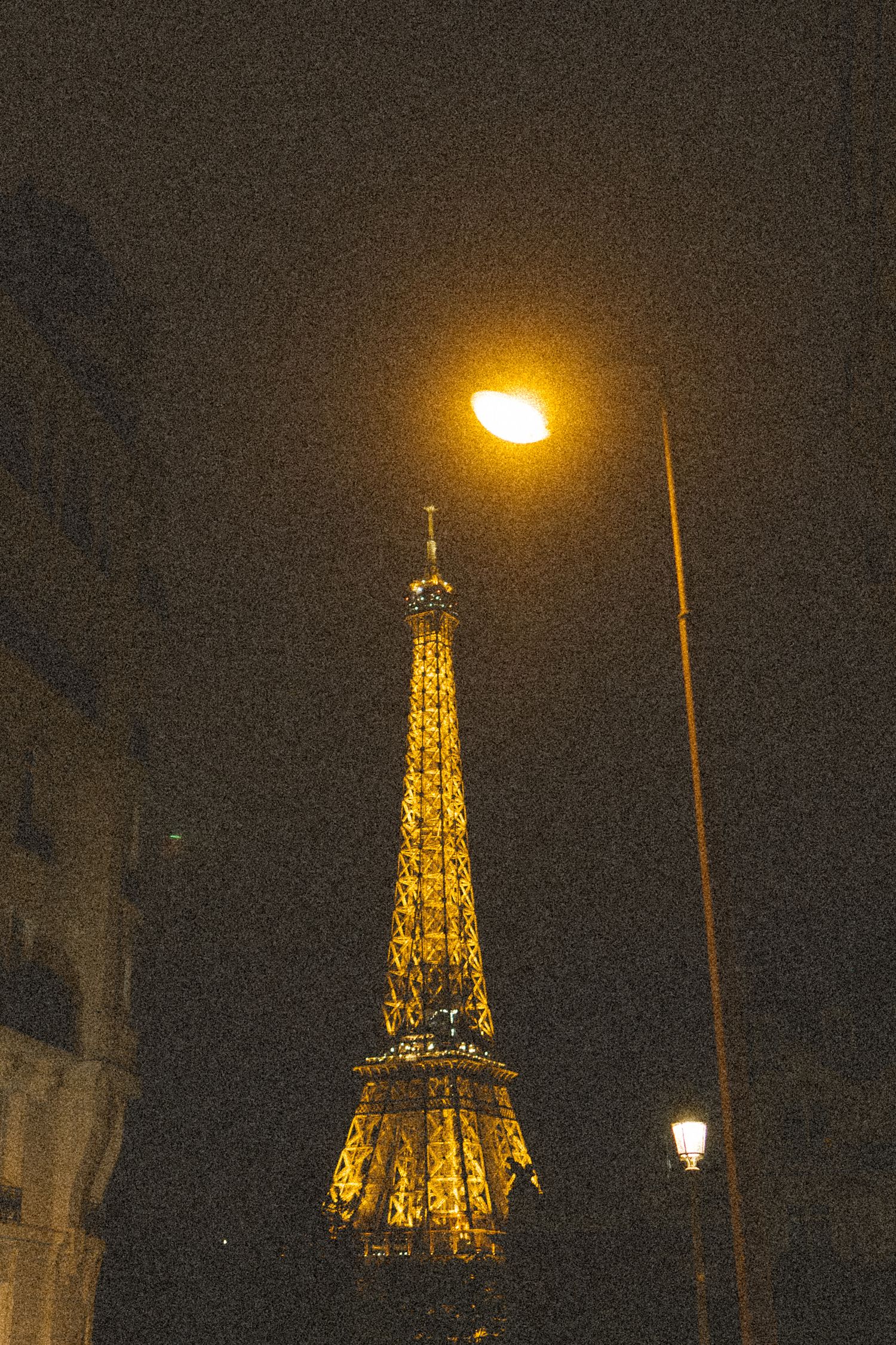 A sequence of nighttime photos showing the illuminated Eiffel Tower glowing golden against a dark Parisian sky.