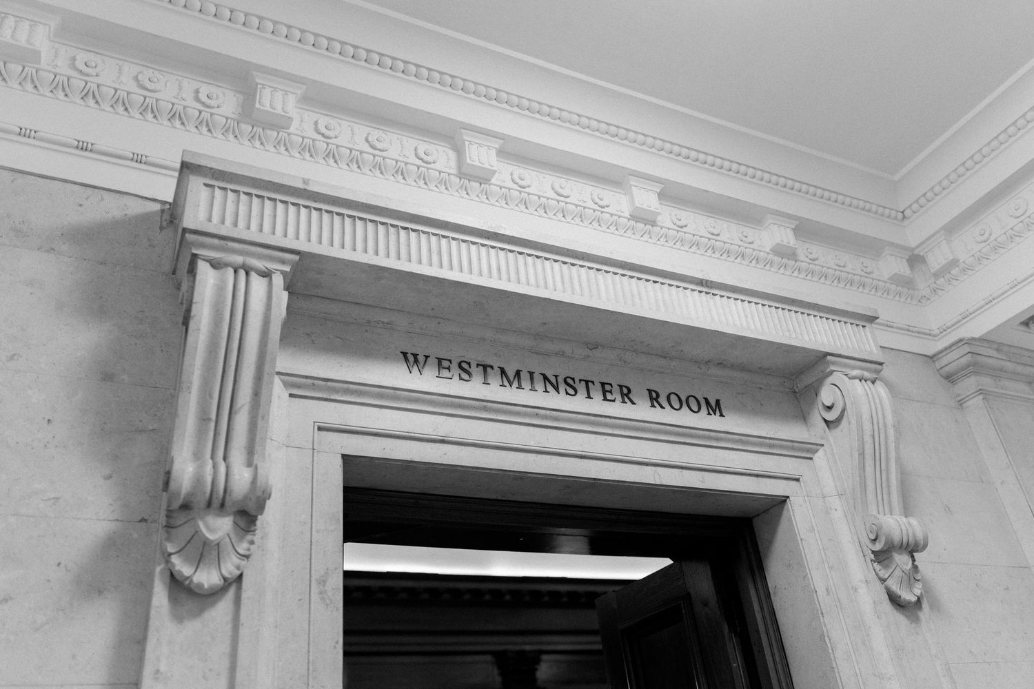 Black and white photo of the Westminster Room entrance at a London registry office.