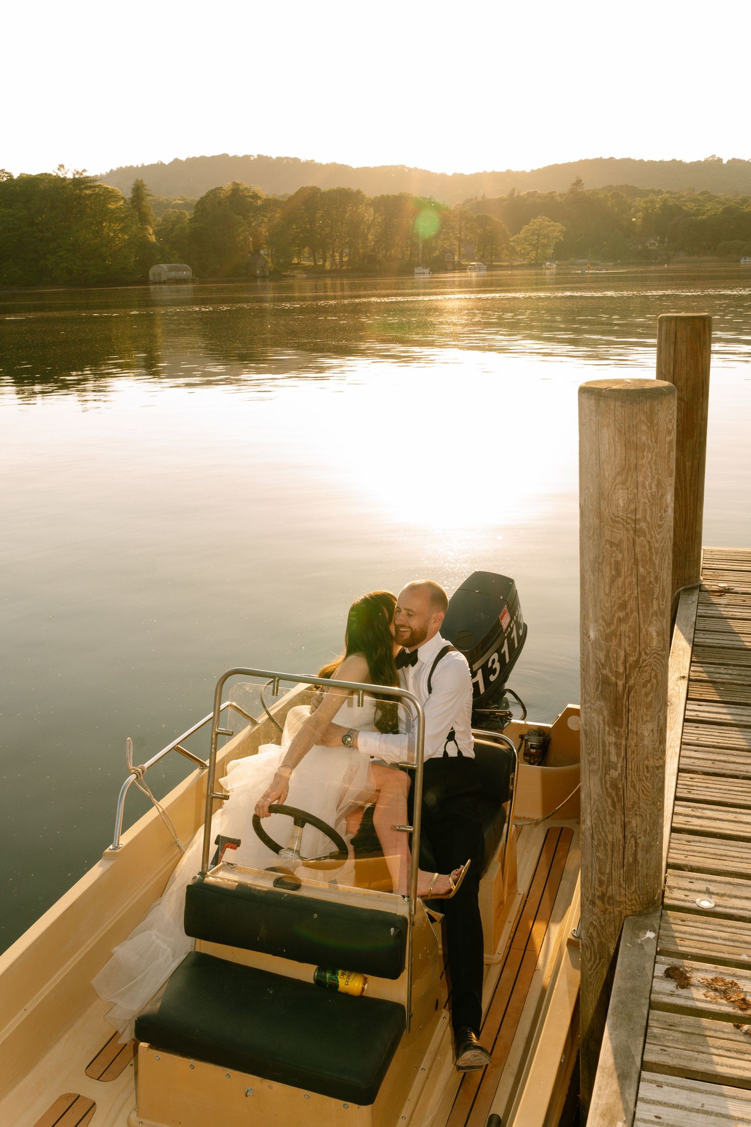 Wedding photo sequence showing couple relaxing on boat dock at sunset.