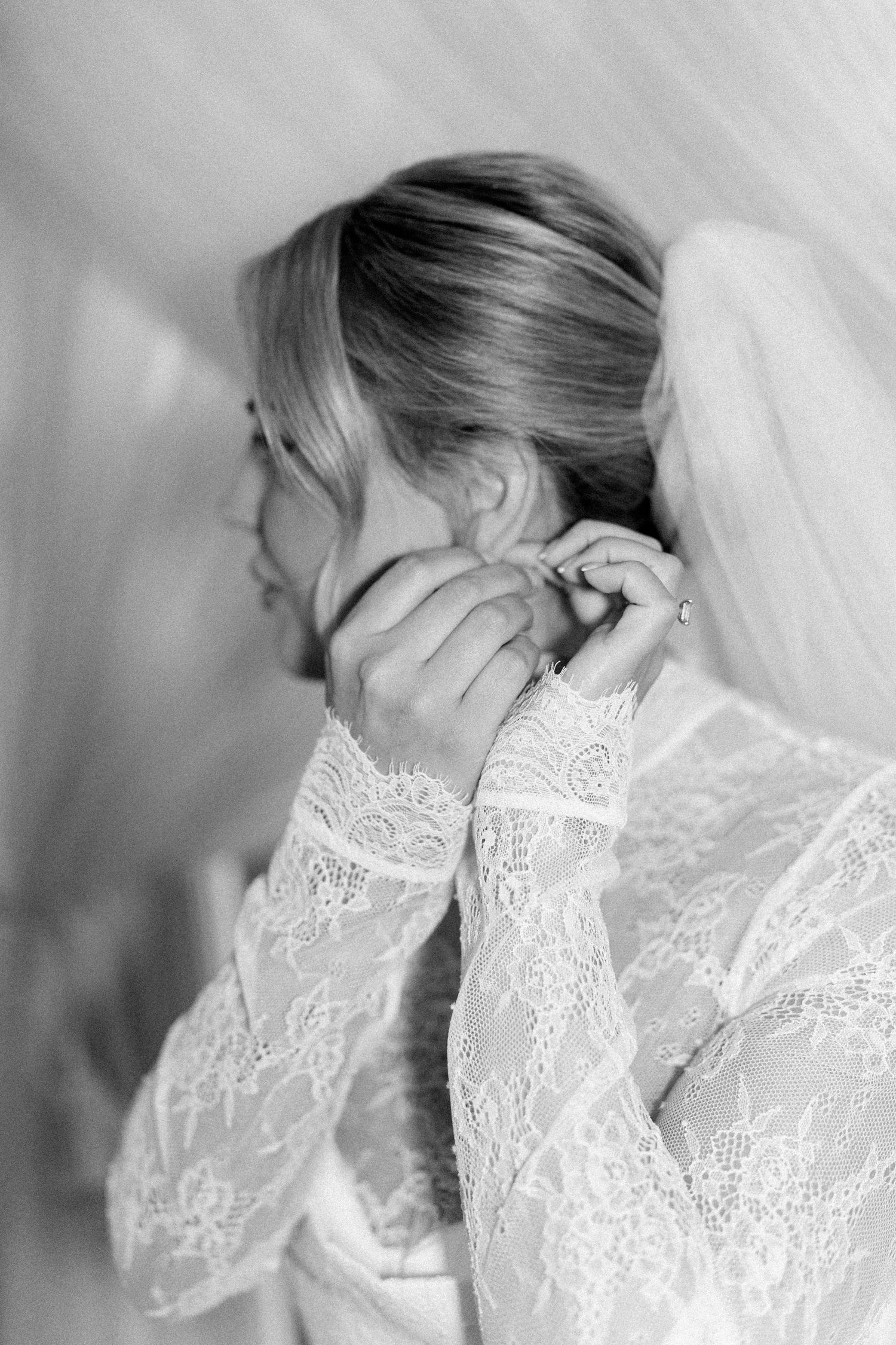Delicate lace details shown in black and white close-up photography.
