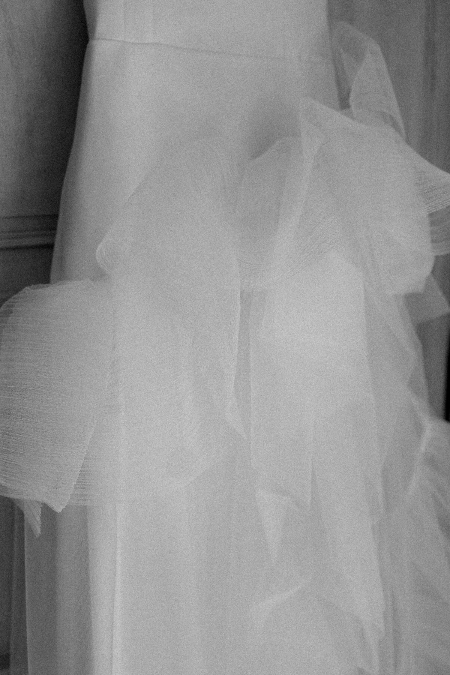 Close-up detail of white tulle fabric in dreamy black and white.