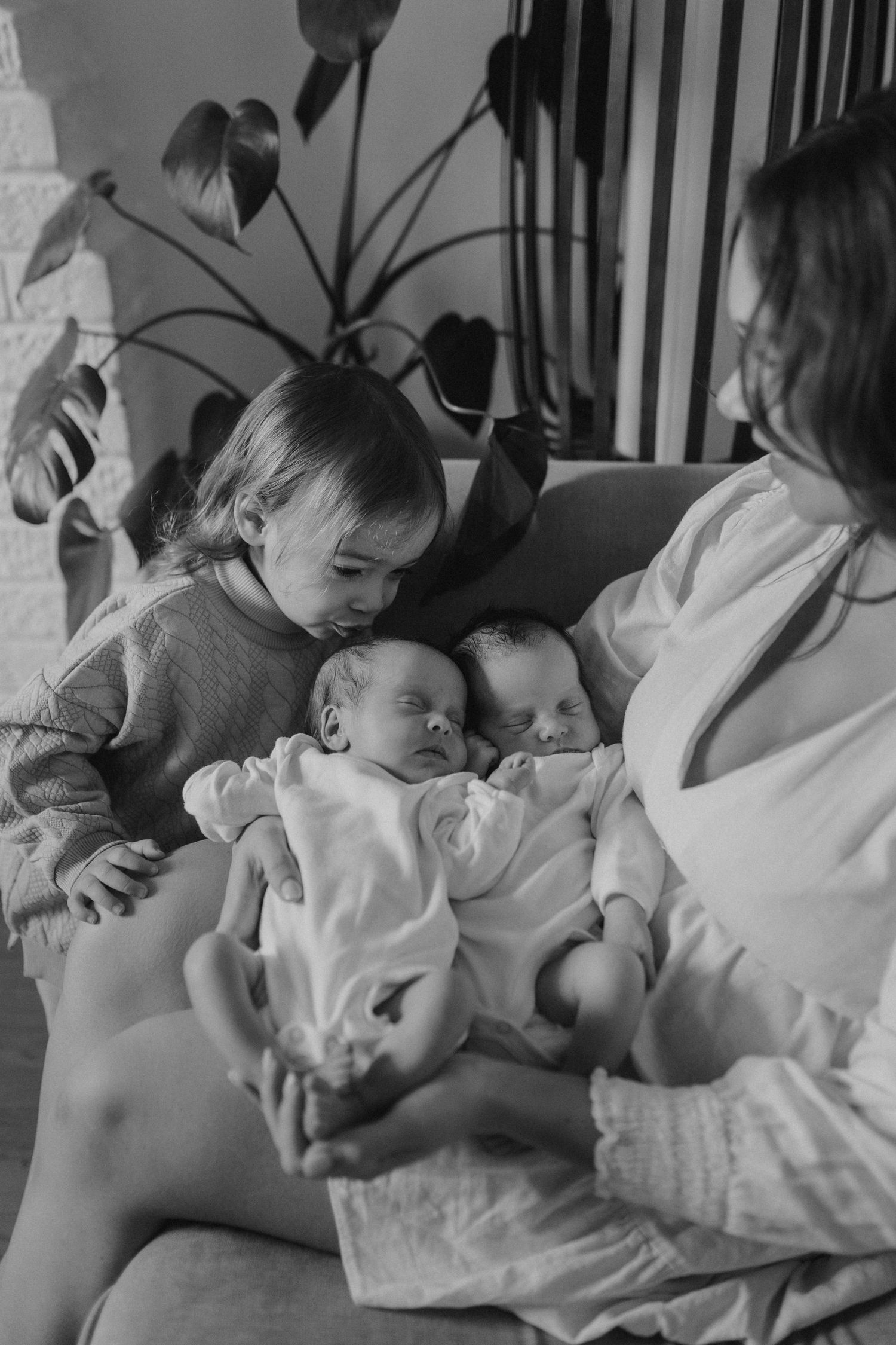 A series of tender moments showing a baby being cradled and fed.