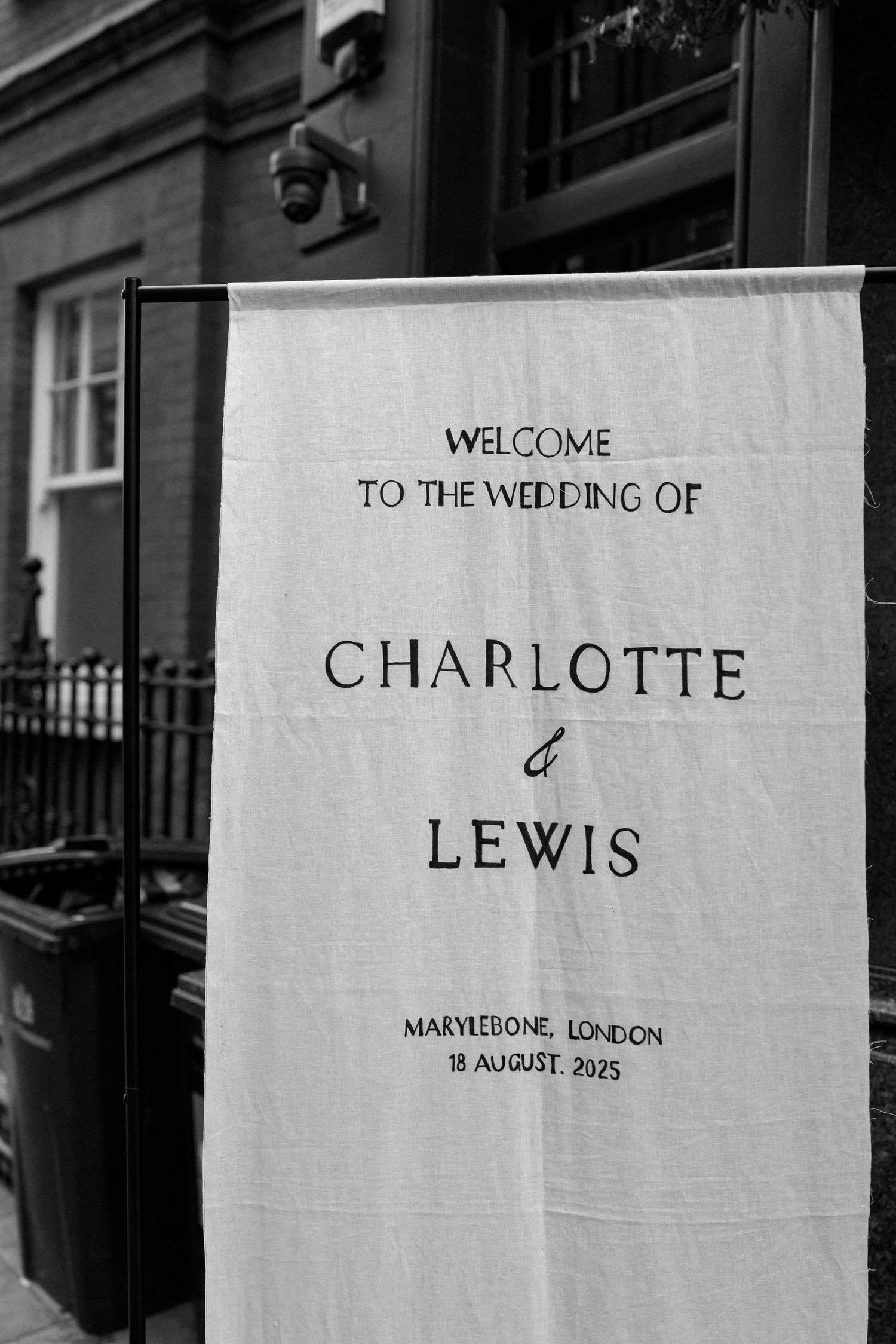 Black and white welcome sign for a wedding at Marylebone London.